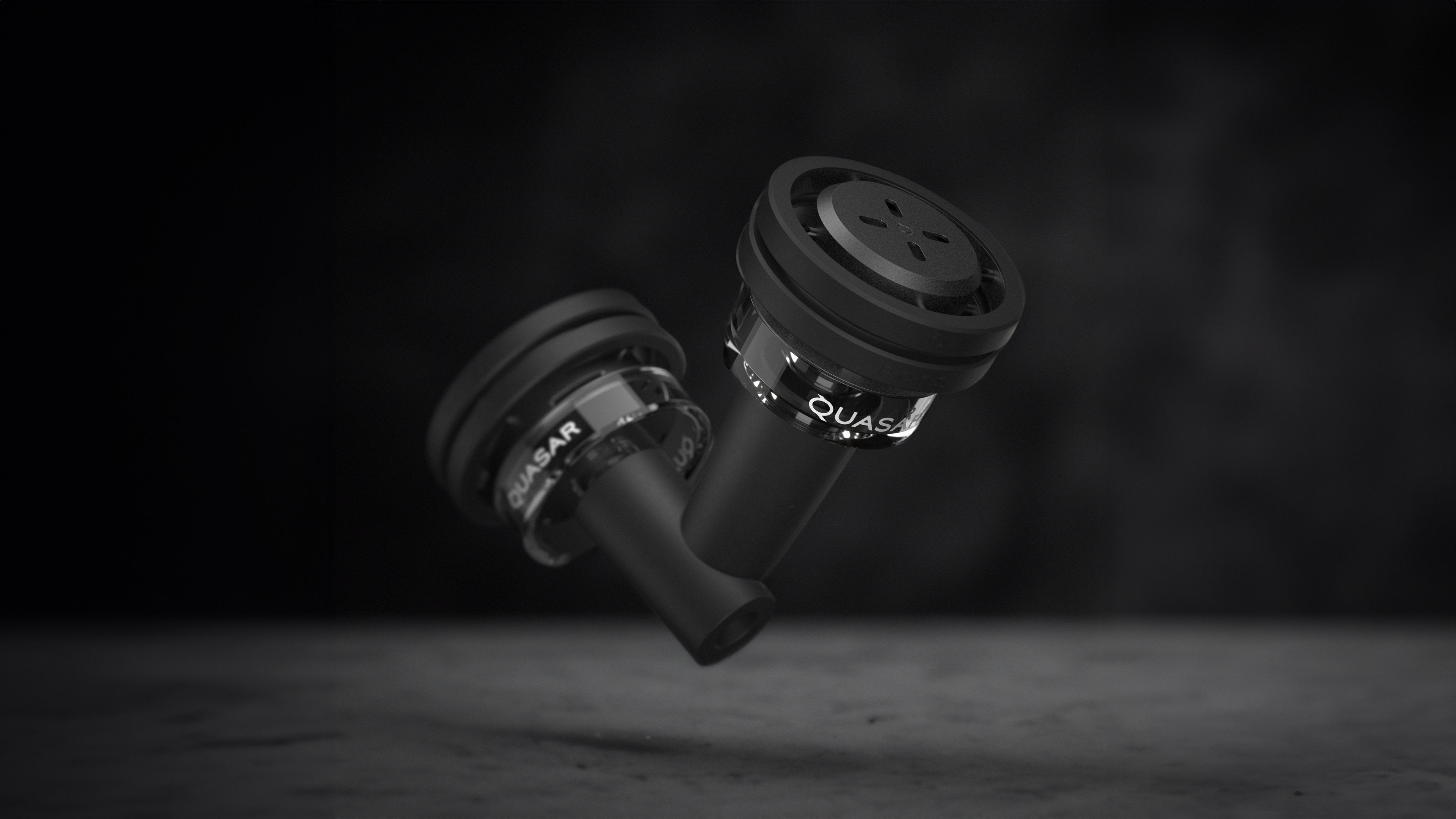 Angled view of Quasar Petit Raas 2 and original Raas 2 suspended in air, showcasing sleek design

