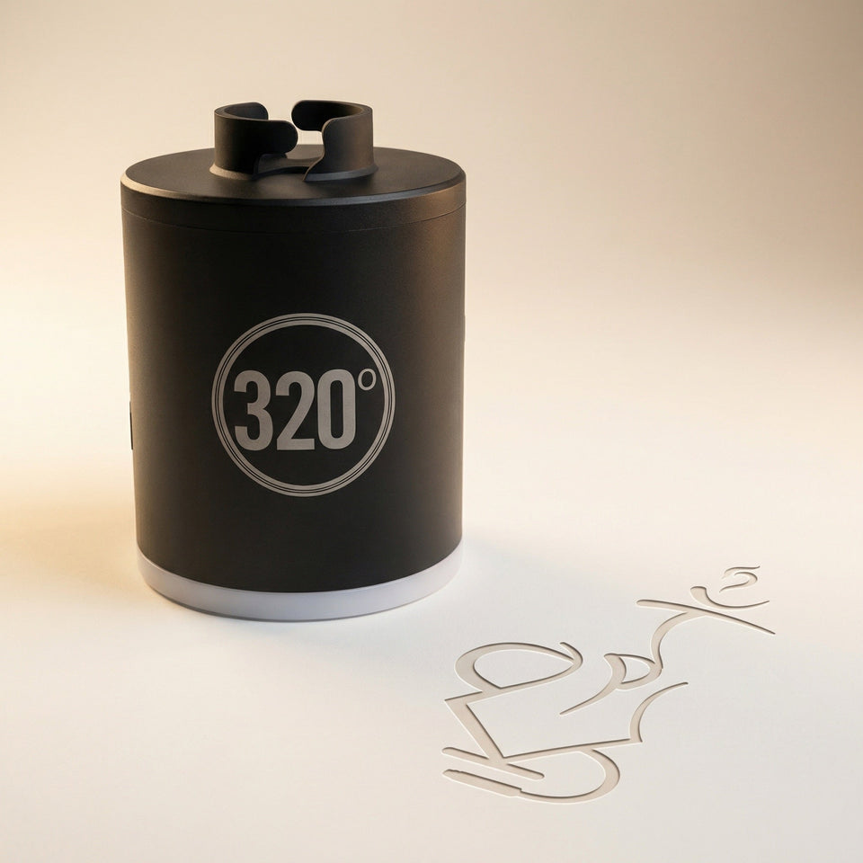 320° LED electric coal starter pump in matte black with light grey circular badge and white translucent LED ring base, photographed in a warm white studio — available at Melbourne's premium shisha store.