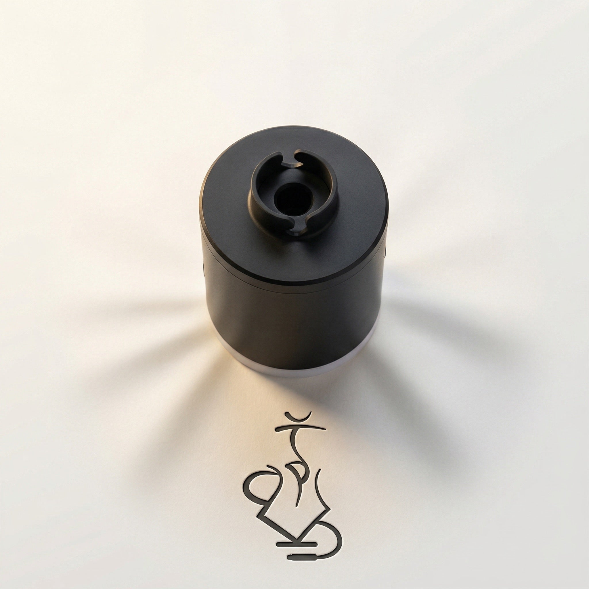 Top-down view of the 320° LED electric shisha starter pump showing the two-prong silicone hose cradle and suction port on the top face of the pump.