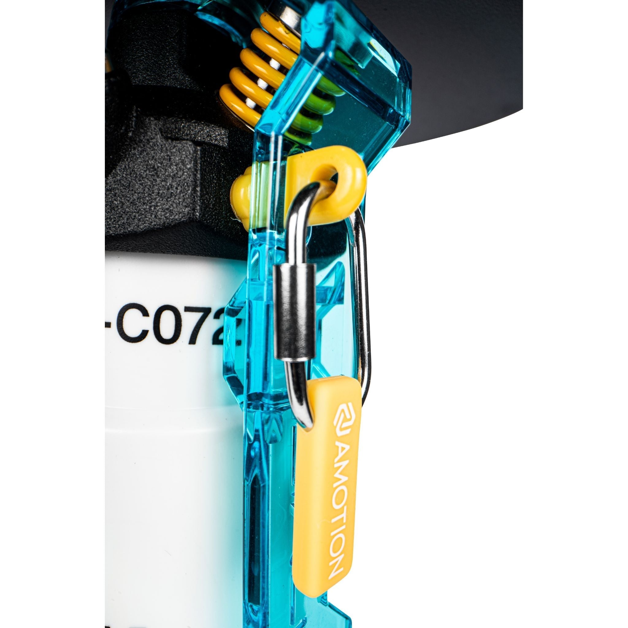 Close-up of the Amotion Flash Bang Arctic shisha translucent blue safety-lever locking mechanism with yellow Amotion pull tag