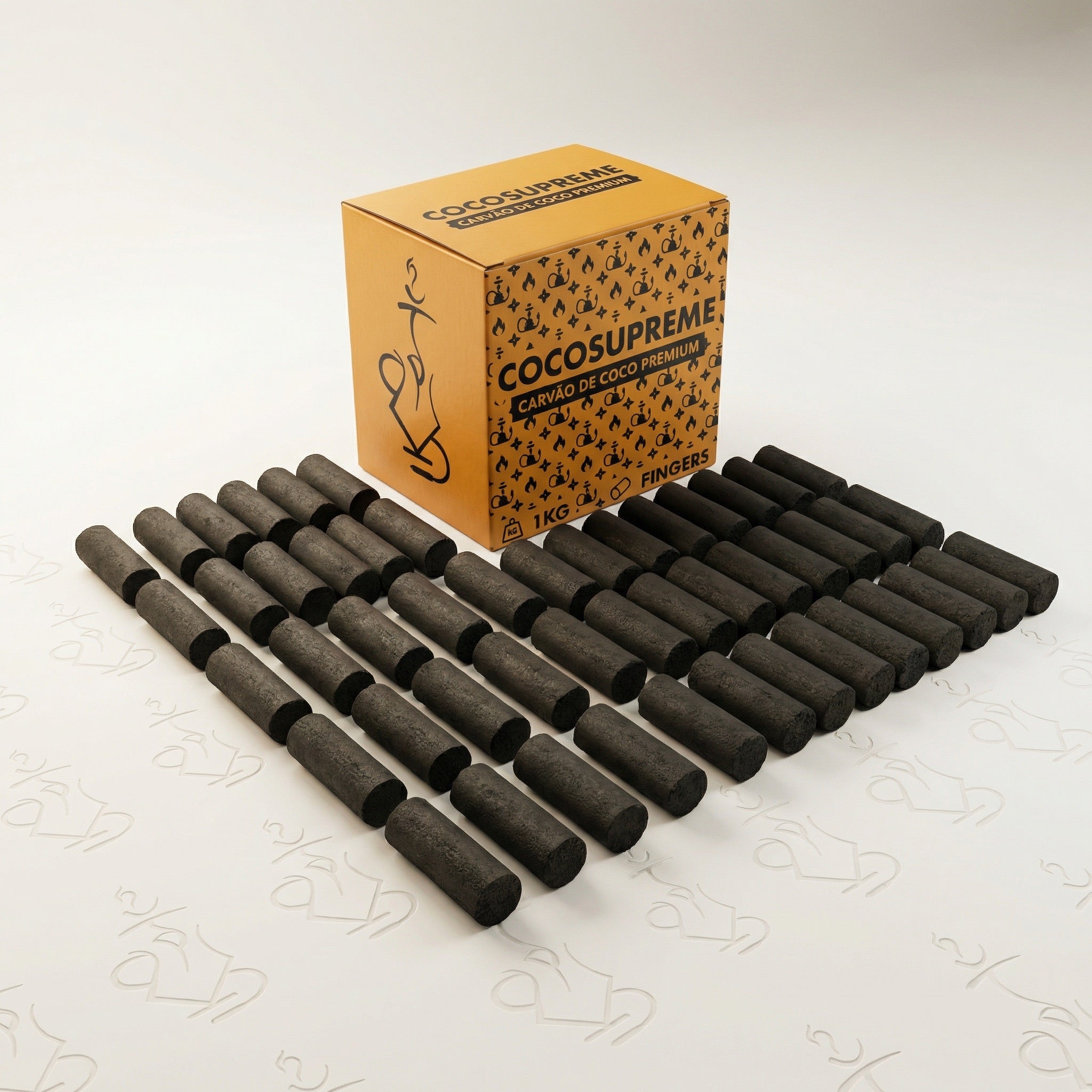 Cocosupreme Fingers 1kg box with approximately 72 solid coconut charcoal finger pieces arranged in neat rows on a warm white studio background.