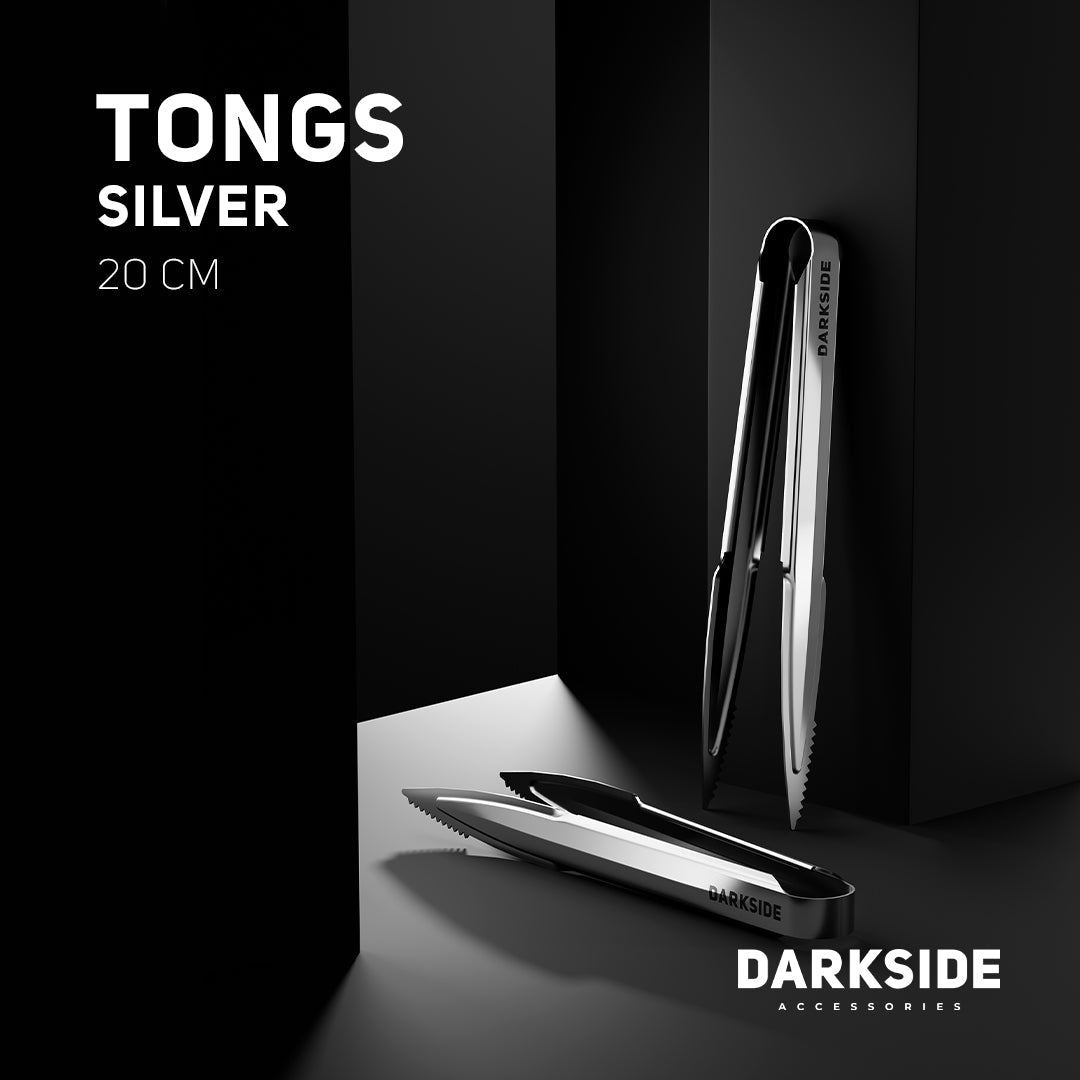 Darkside 20cm silver tongs shown upright and lying flat against a dark backdrop with logo