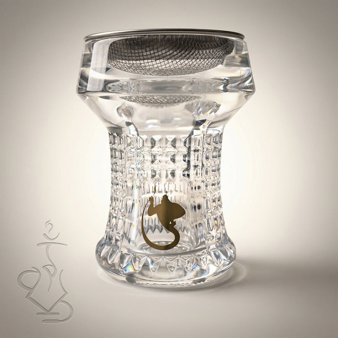 Dschinni Nero crystal glass shisha head with cut-crystal waffle texture, gold Dschinni emblem, and Seflex stainless mesh insert visible through the clear glass bowl.