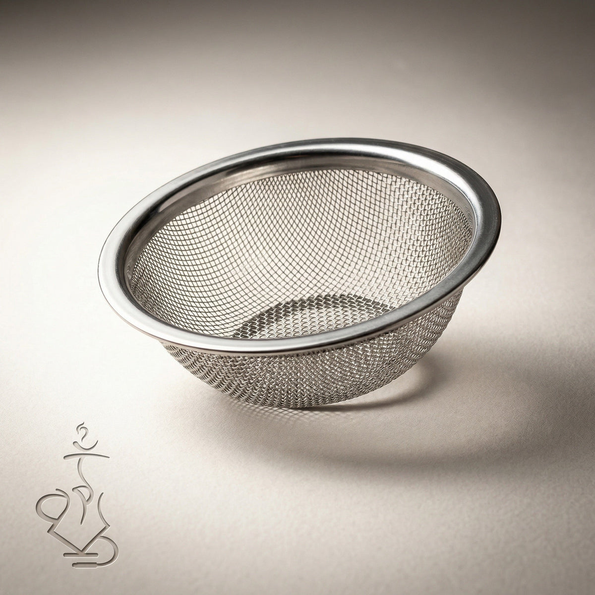 Dschinni Seflex stainless steel mesh insert with smooth rolled rim and fine woven concave mesh for consistent airflow in the Nero glass head., image 3 of 9