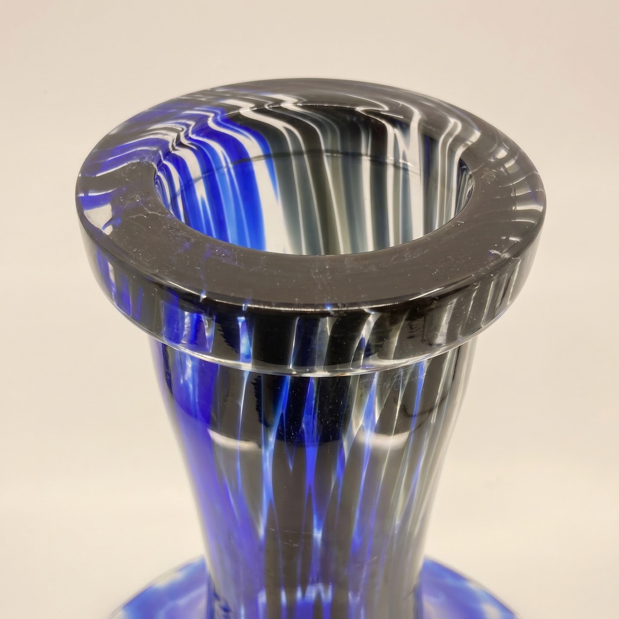 Macro detail of Cobalt Galaxy shisha vase rolled lip showing substantial hand-blown glass wall thickness