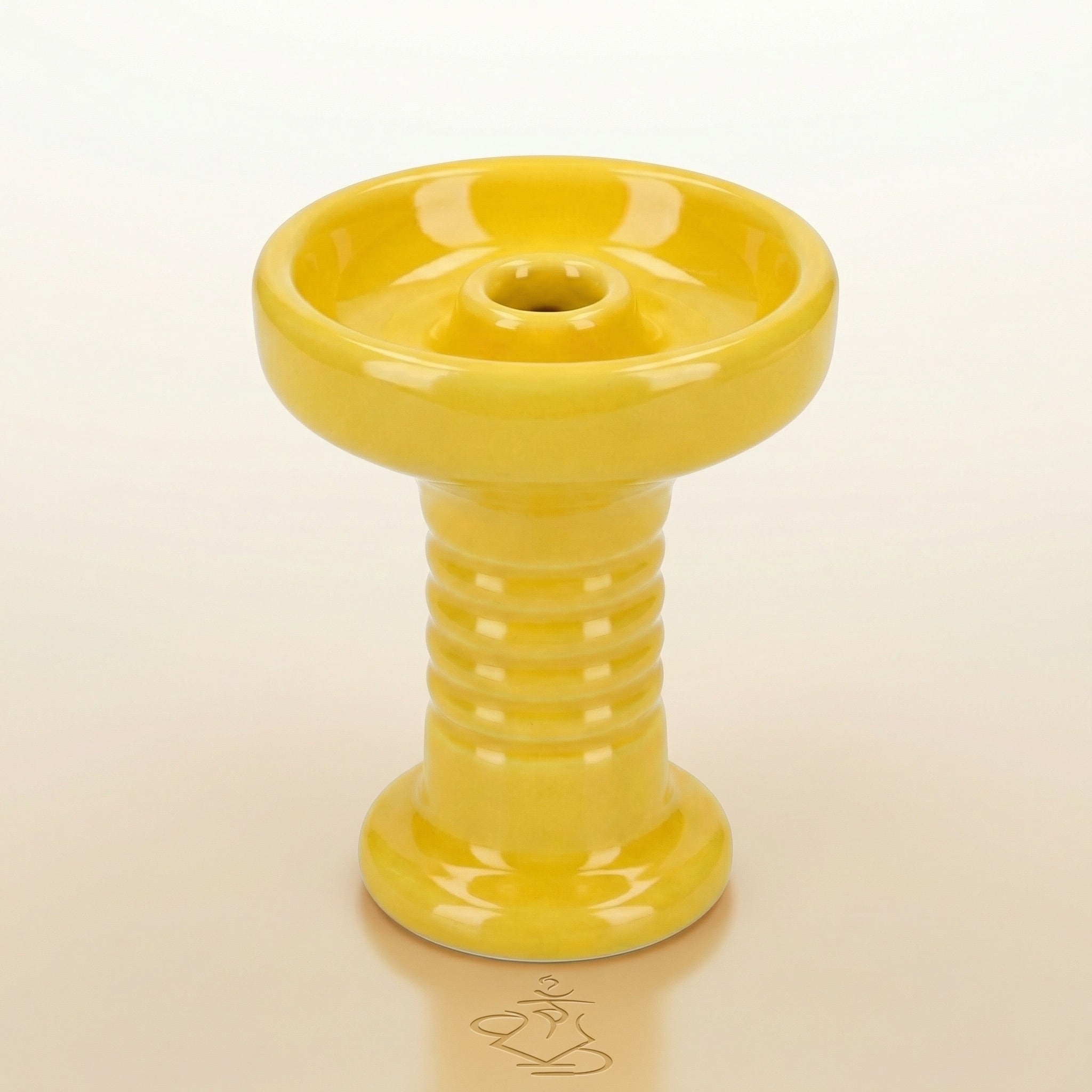 Essentials Glazed Phunnel Bowl in bright yellow, handmade clay with glossy glaze, showing the wide rim, concave basin, raised central spire, and ribbed stem in a clean studio setting.