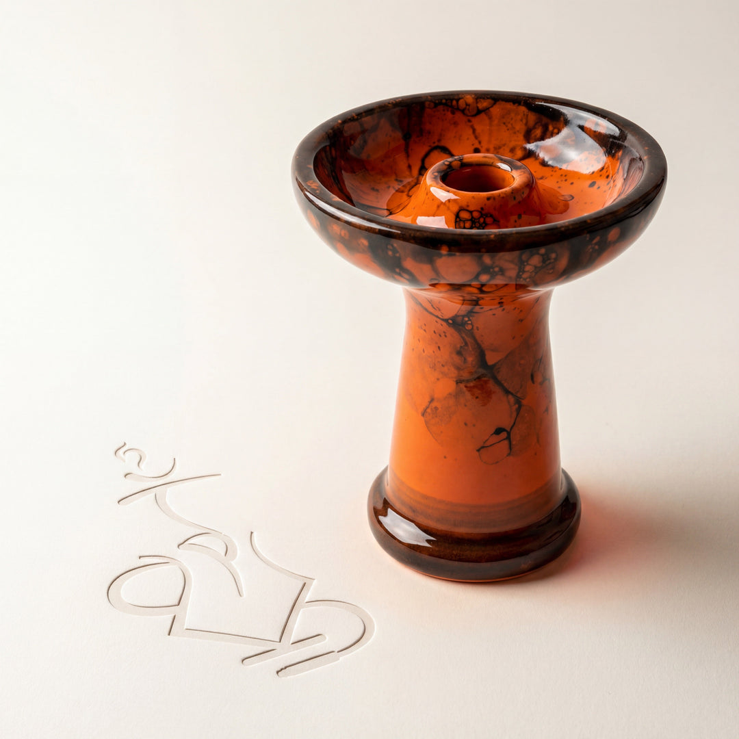 Essentials King Phunnel Bowl in Blaze orange glaze with dark bubble-marble pattern, warm studio shot