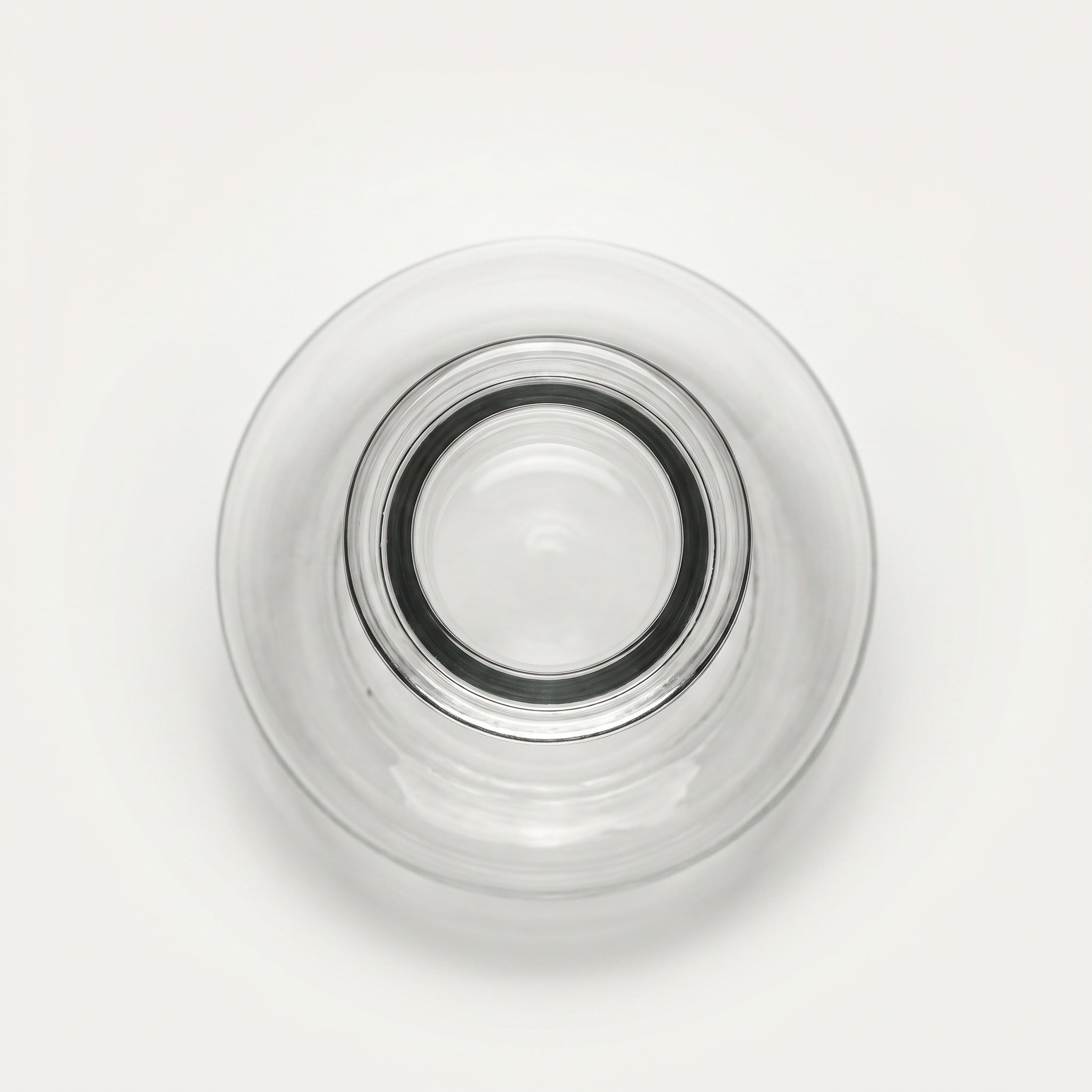 Top-down view of the Essentials Tear Drop hand-rolled lip and 45mm Russian-fit neck opening, clear hand-blown glass