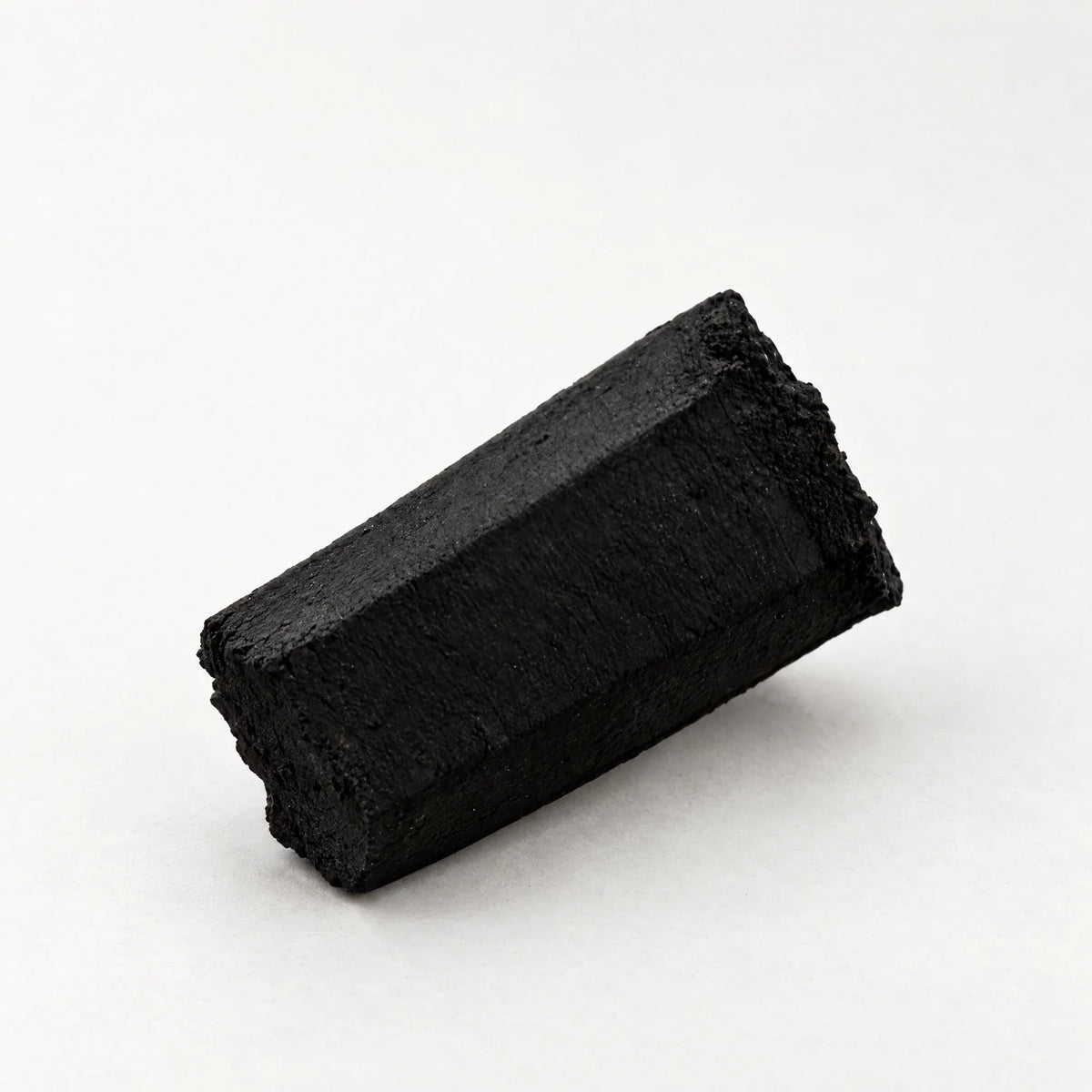One Cerberus Coco Gen 2 hexagonal coconut shisha charcoal stick, 23 x 48 mm, on white, image 3 of 3