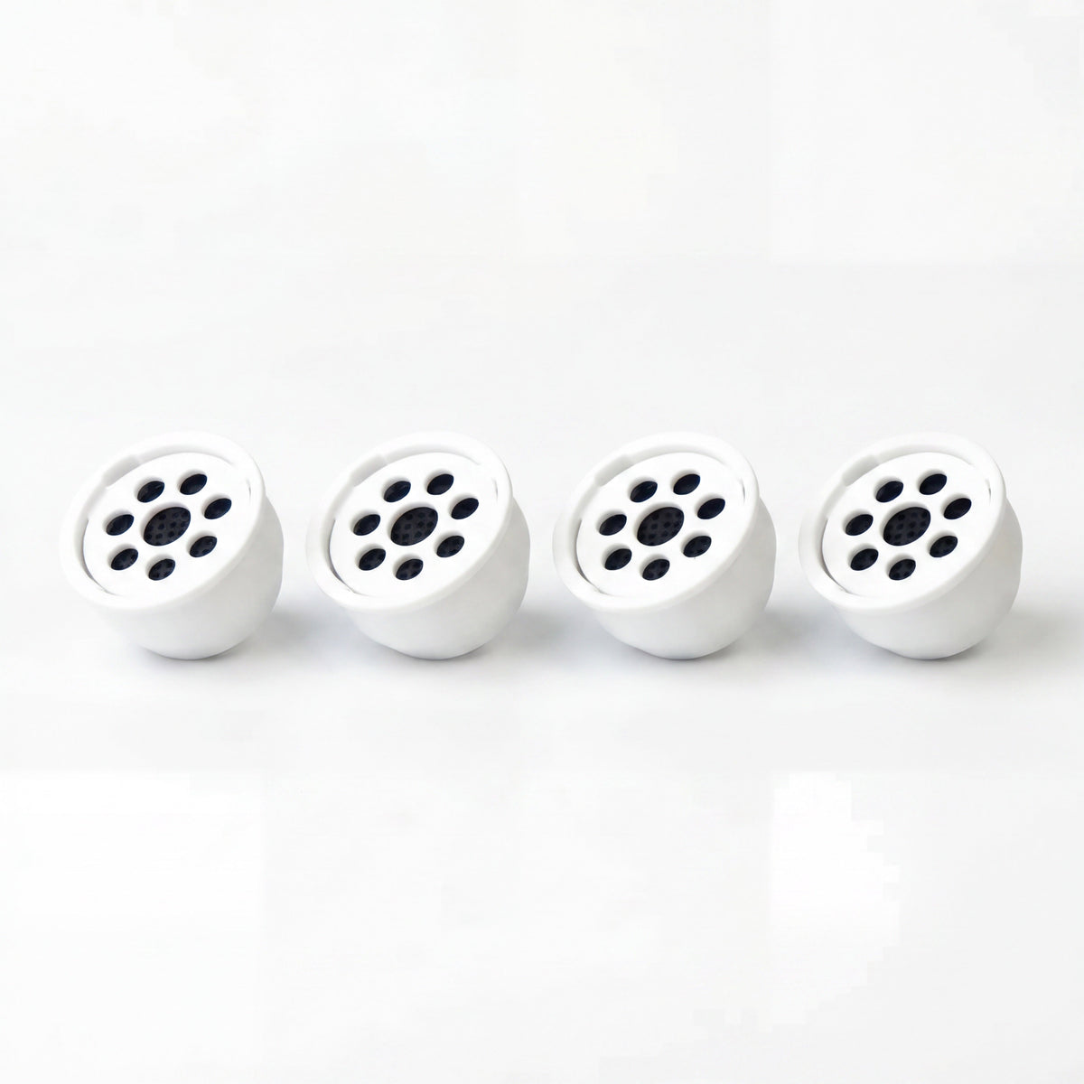 Kaloud Ayara Large replacement filters 4-pack lined up on pure white, filter faces forward, image 3 of 10