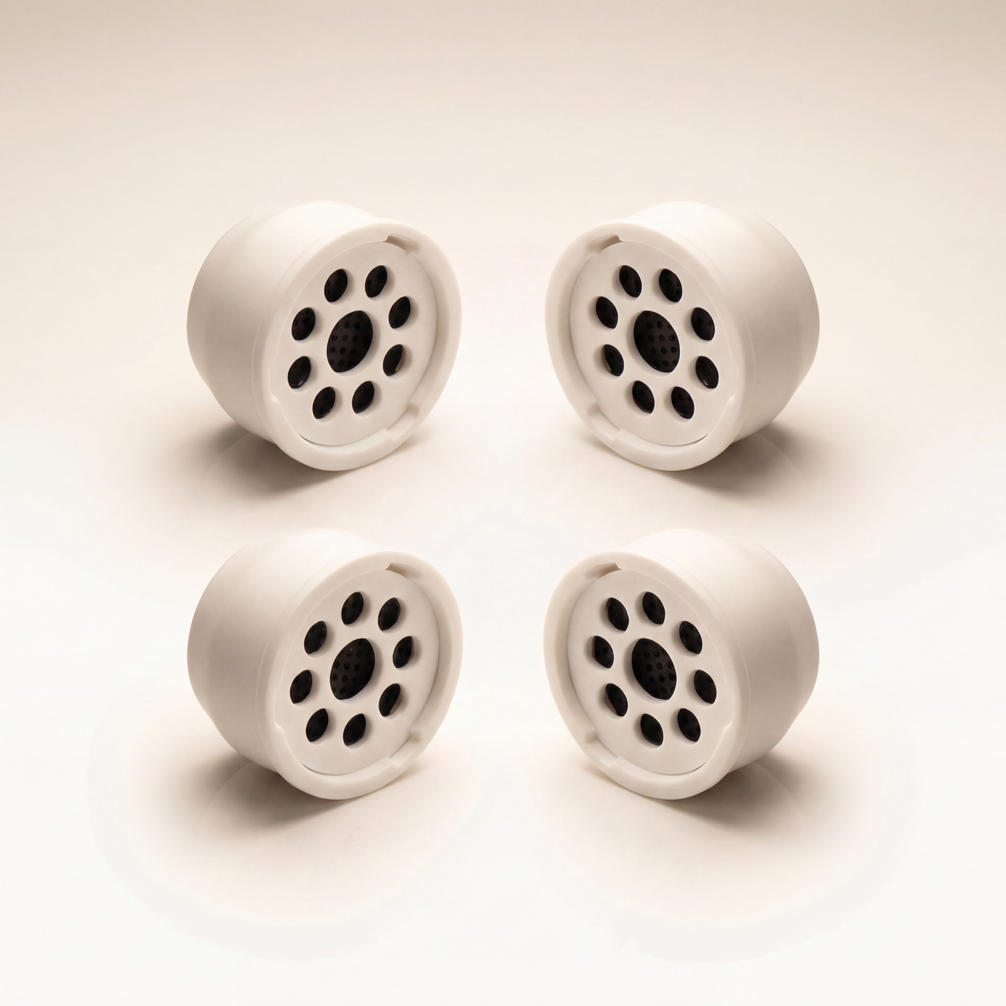 Kaloud Ayara Large replacement pods 4-pack on warm studio white, activated carbon flower-pattern filter faces — The Premium Way
