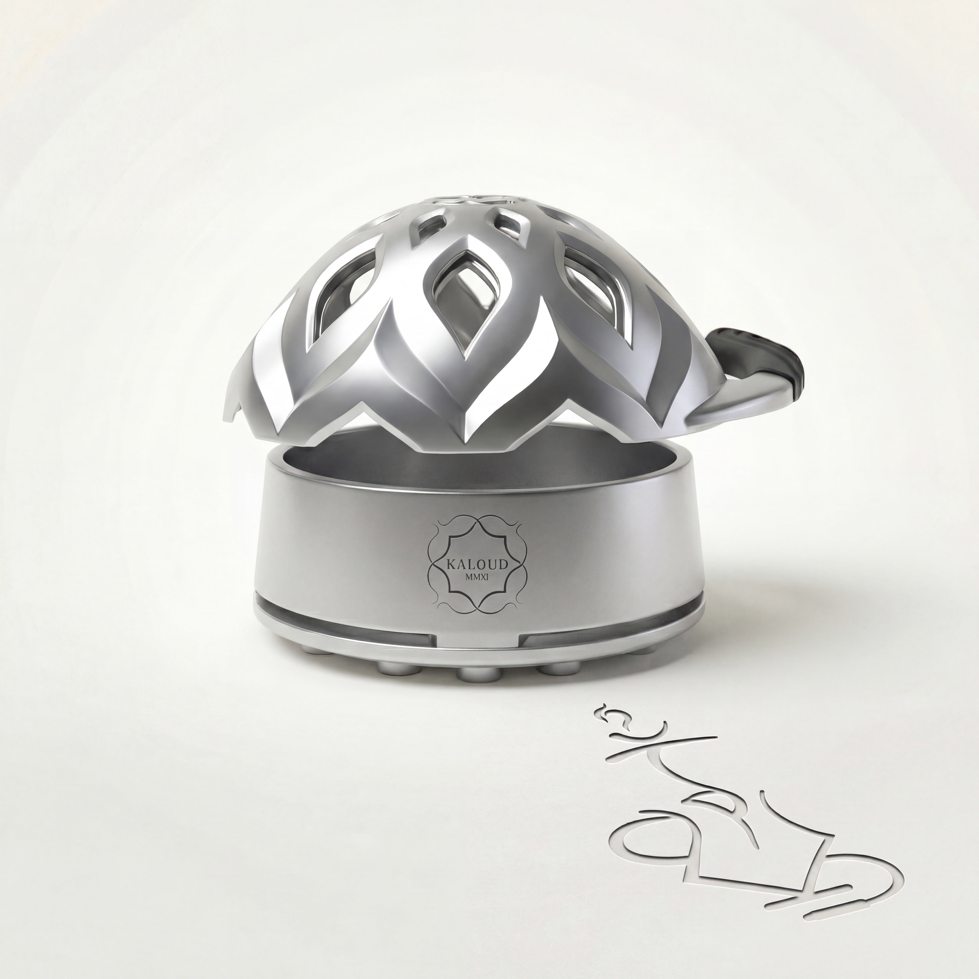 Kaloud Lotus I+3 Argis Silver heat management device, brushed stainless steel base and ornate lotus-petal aluminium lid with central Kaloud K crest, photographed in studio.
