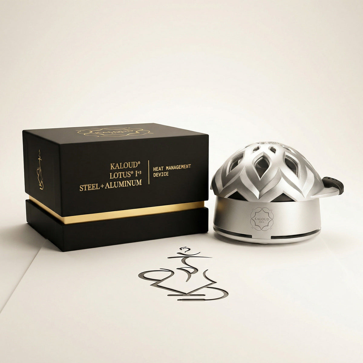 Kaloud Lotus I+3 Argis Silver heat management device displayed beside its premium matte black retail box with gold foil Kaloud branding., image 13 of 19