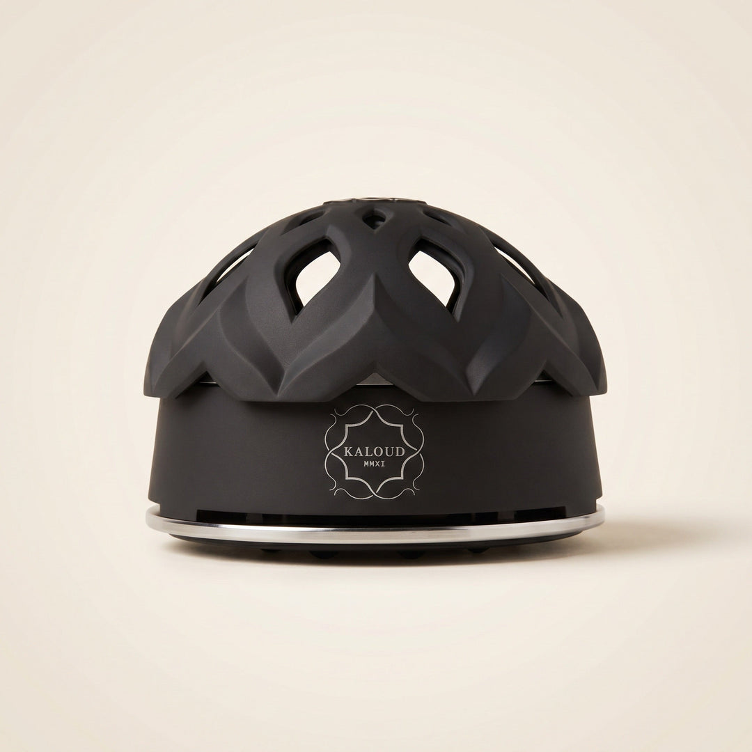 Kaloud Lotus I+3 Niris Black HMD with matte black base, polished silver rim, and lotus-petal vented lid