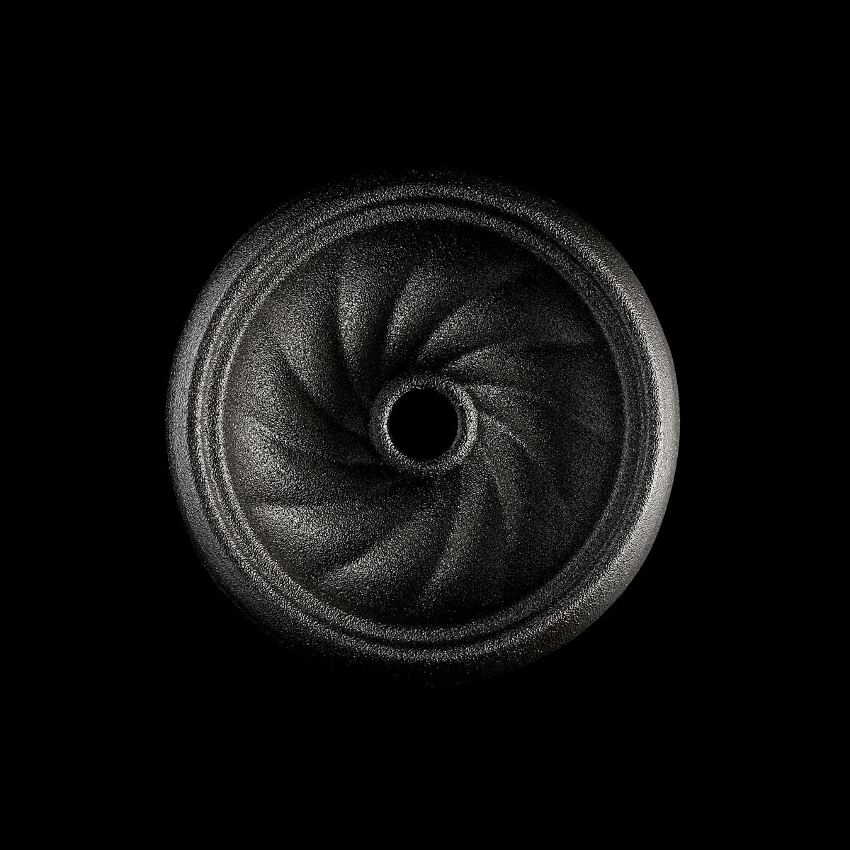 Top-down view of Kaloud Samsaris Kore all ceramic phunnel bowl showing centre spire and swirl channels