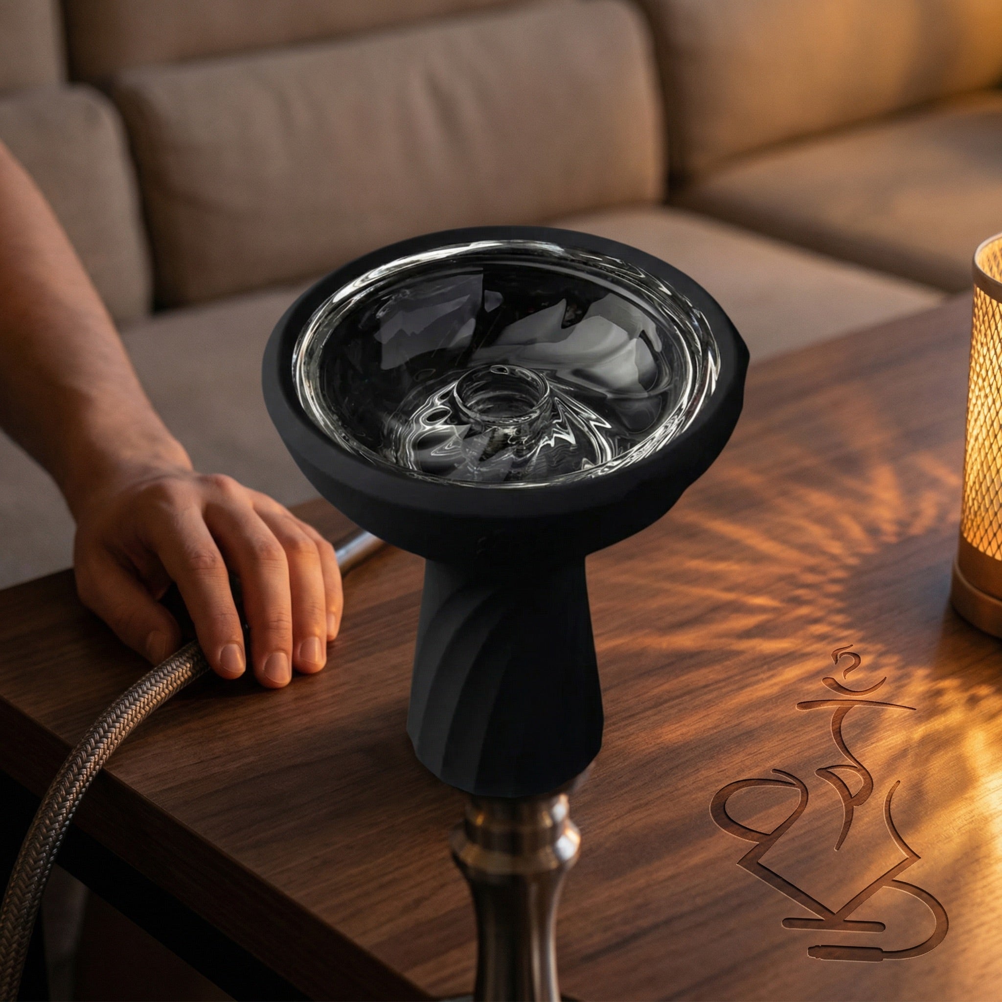 Kaloud Samsaris Vitria III glass hybrid shisha bowl mounted on a hookah with clear glass interior refracting warm ambient light