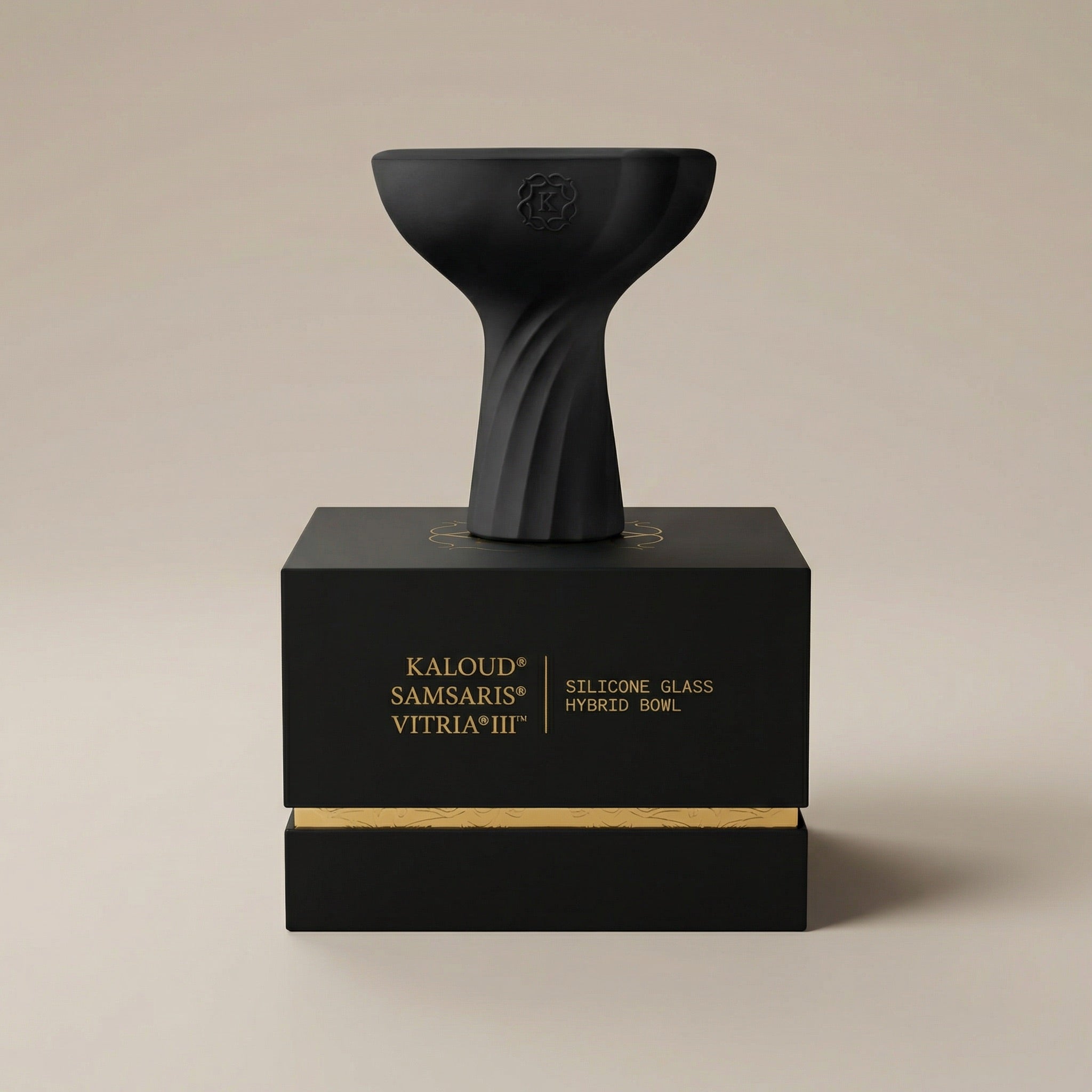Kaloud Samsaris Vitria III glass hybrid shisha bowl resting on premium black-and-gold Kaloud presentation box