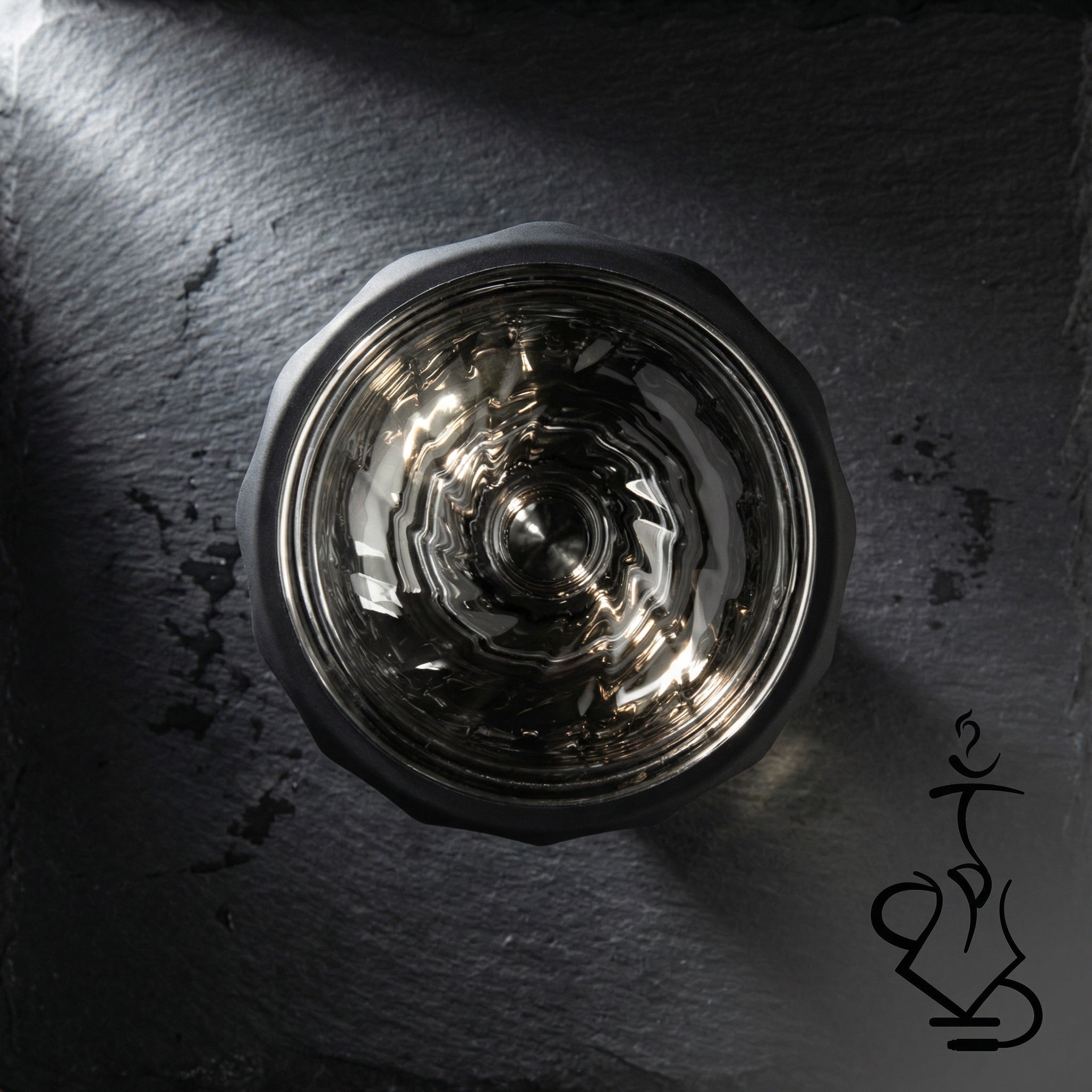 Overhead view of the Kaloud Samsaris Vitria III showing clear borosilicate glass interior with individual flavour chambers and central spire