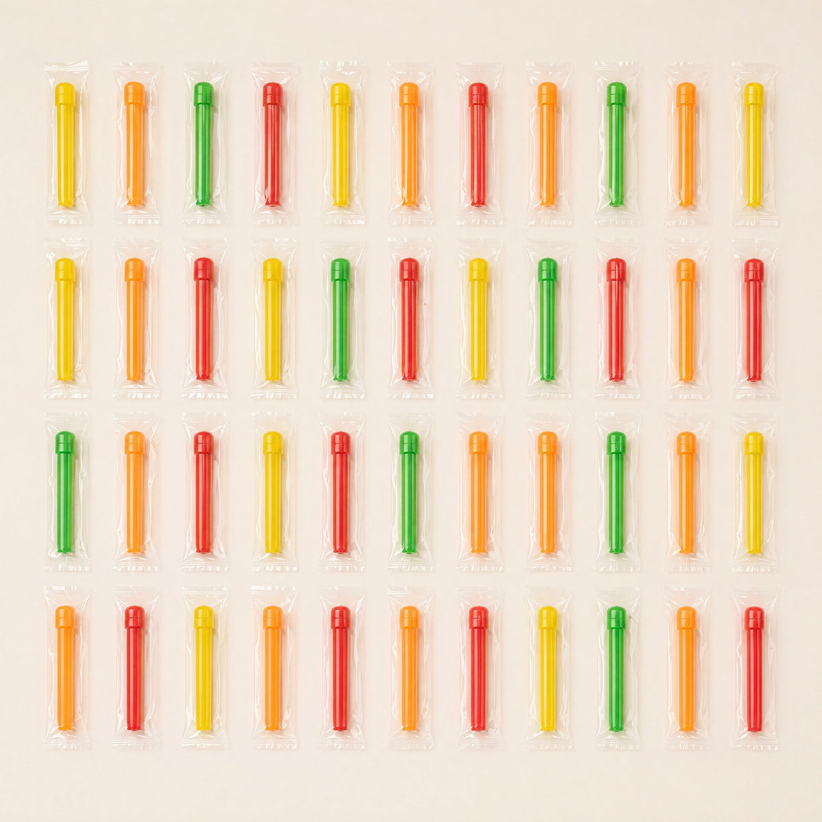 Forty-four individually wrapped Khalil Mamoon disposable shisha tips laid out in a grid showing the multi-colour pack contents, image 3 of 10