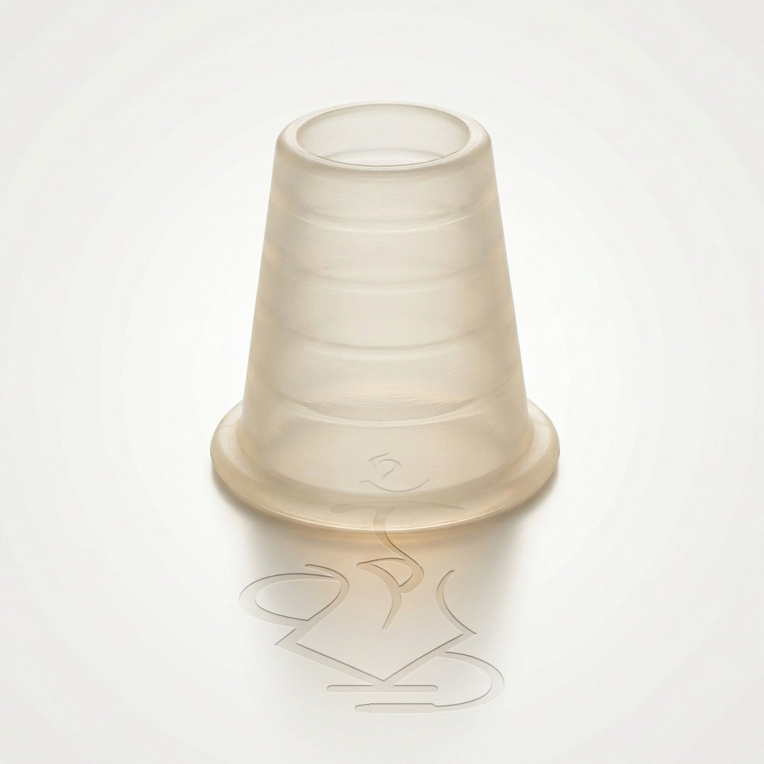 Khalil Mamoon clear silicone head grommet for hookah, bell-shaped with ridged body and flanged base, photographed on a warm white studio background