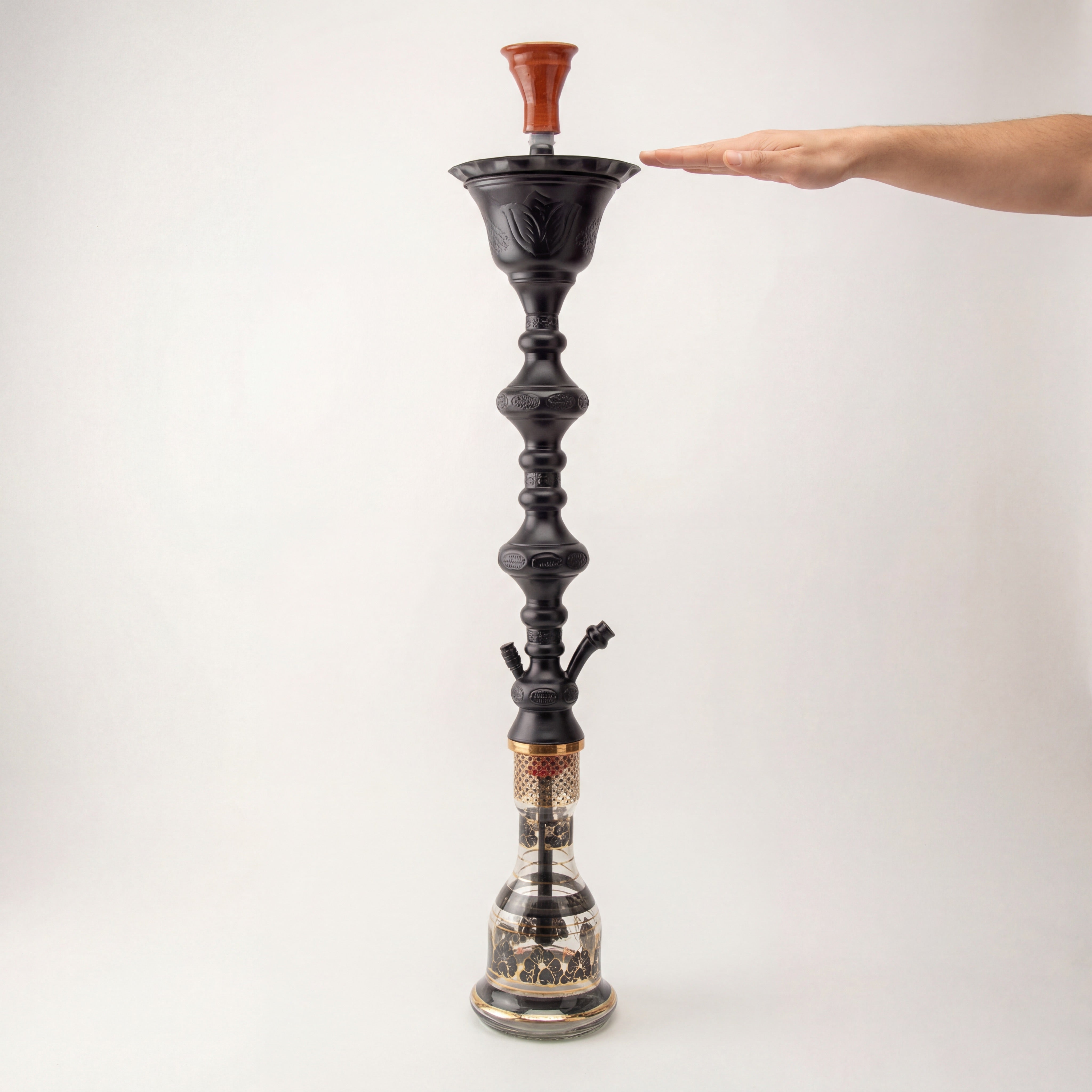 Khalil Mamoon Ice Shareef Black 90cm hookah with hand at bowl height showing flagship 90cm scale