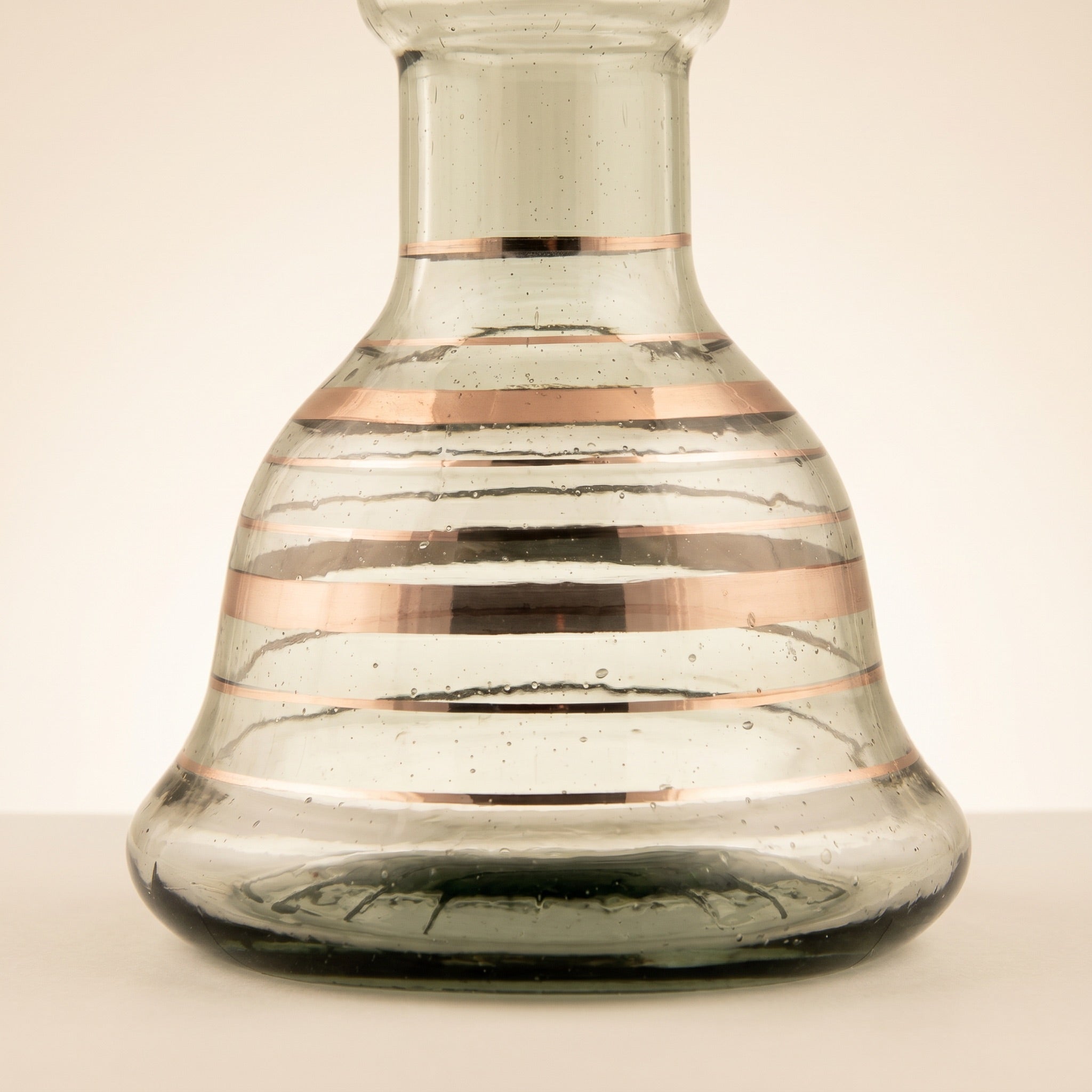 Close-up of Khalil Mamoon Mini Beast base, hand-painted stripes and seed bubbles in Egyptian glass, The Premium Way