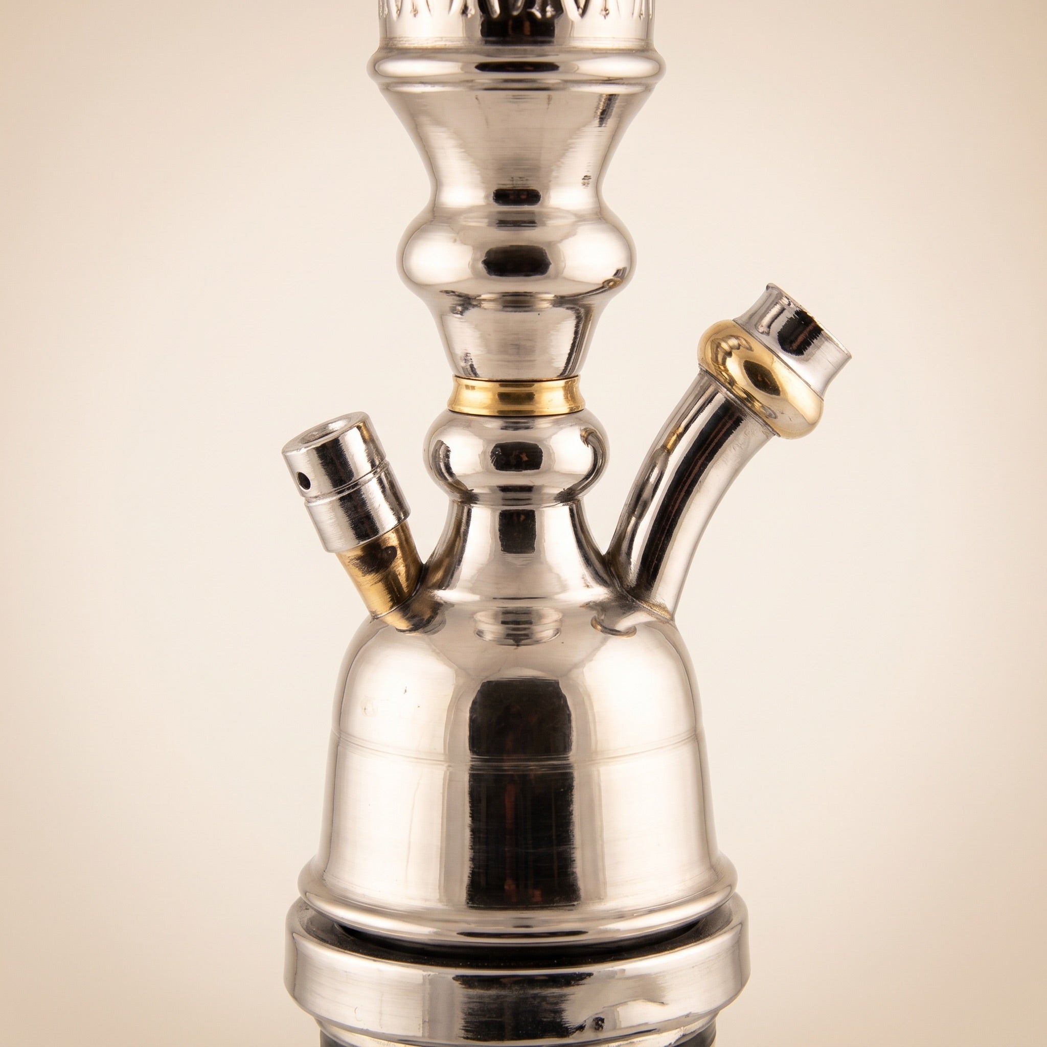 Close-up of Khalil Mamoon Omda Steel 1141 hose port dome with brass accent rings and hand-welded stainless steel knuckle