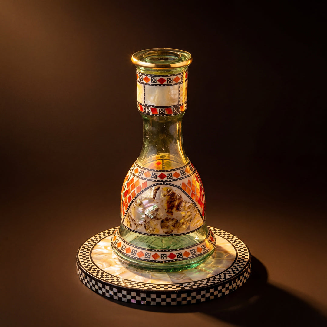 Khalil Mamoon Sadaf hookah base on mother-of-pearl and chequer plinth in warm dark studio