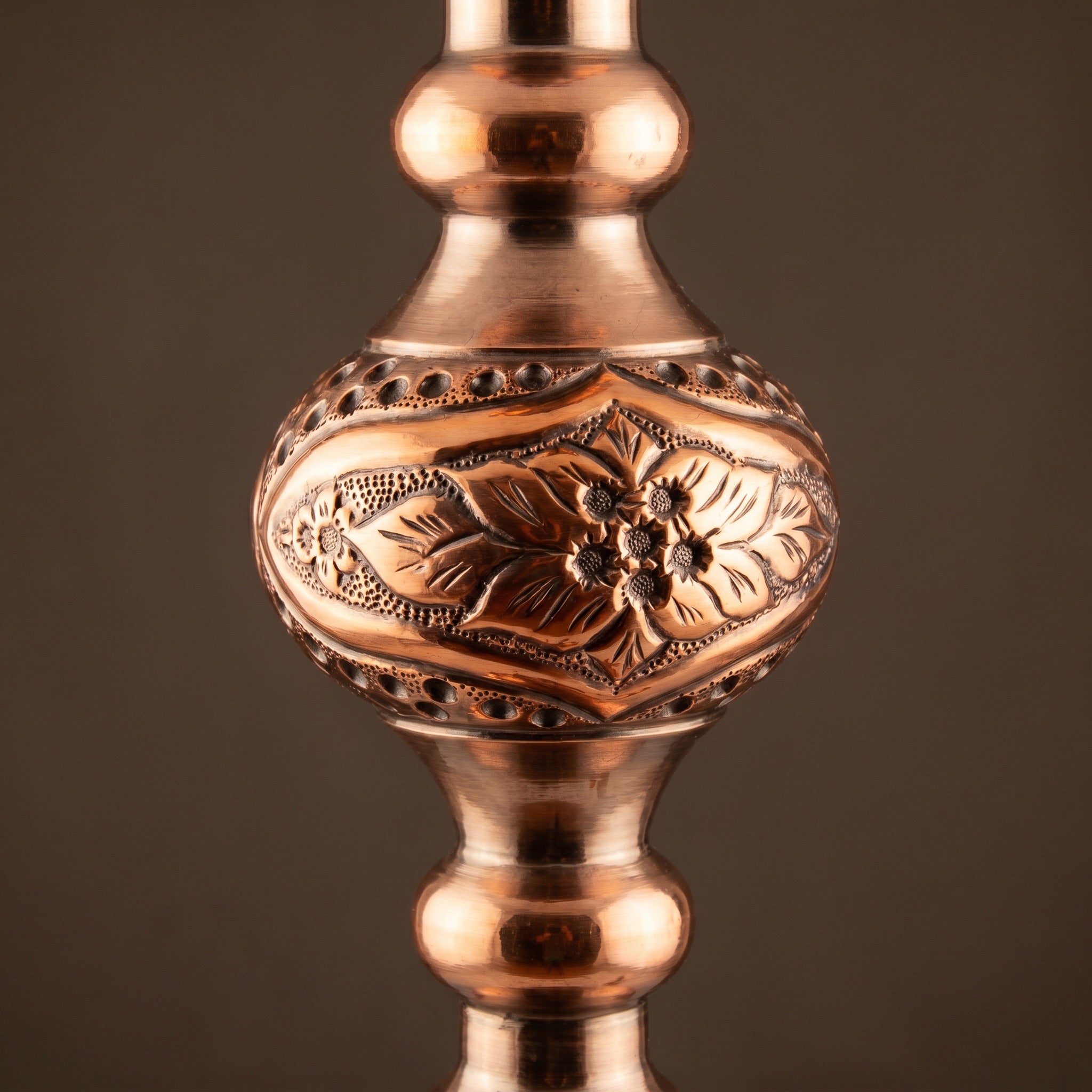 Hand-engraved copper stem detail on Khalil Mamoon Sharqawi 2, raised floral relief and punched-dot bordering
