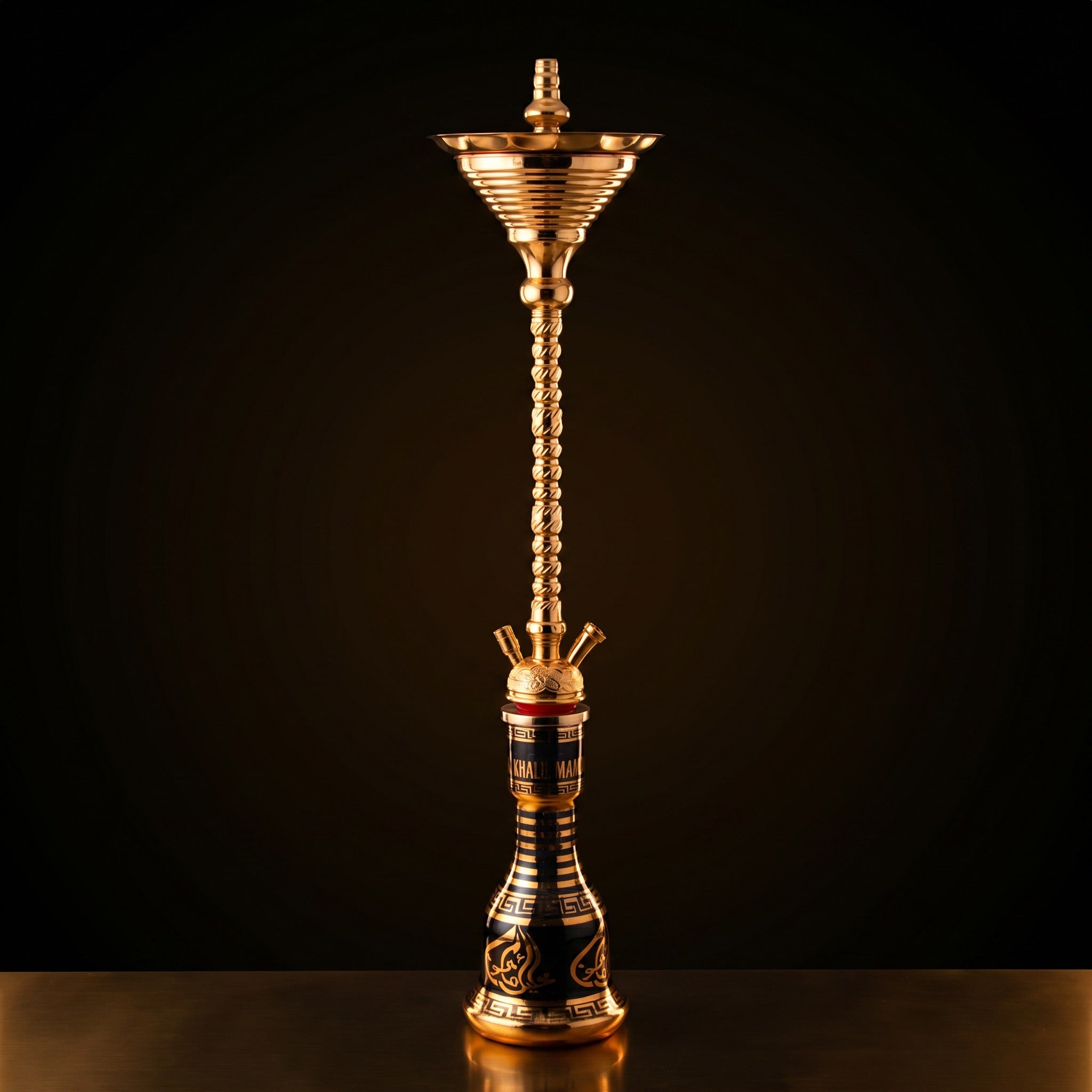 Khalil Mamoon Skinny Gold 90cm slim silhouette in warm dark studio showing spiral stem and ribbed ice chamber cone