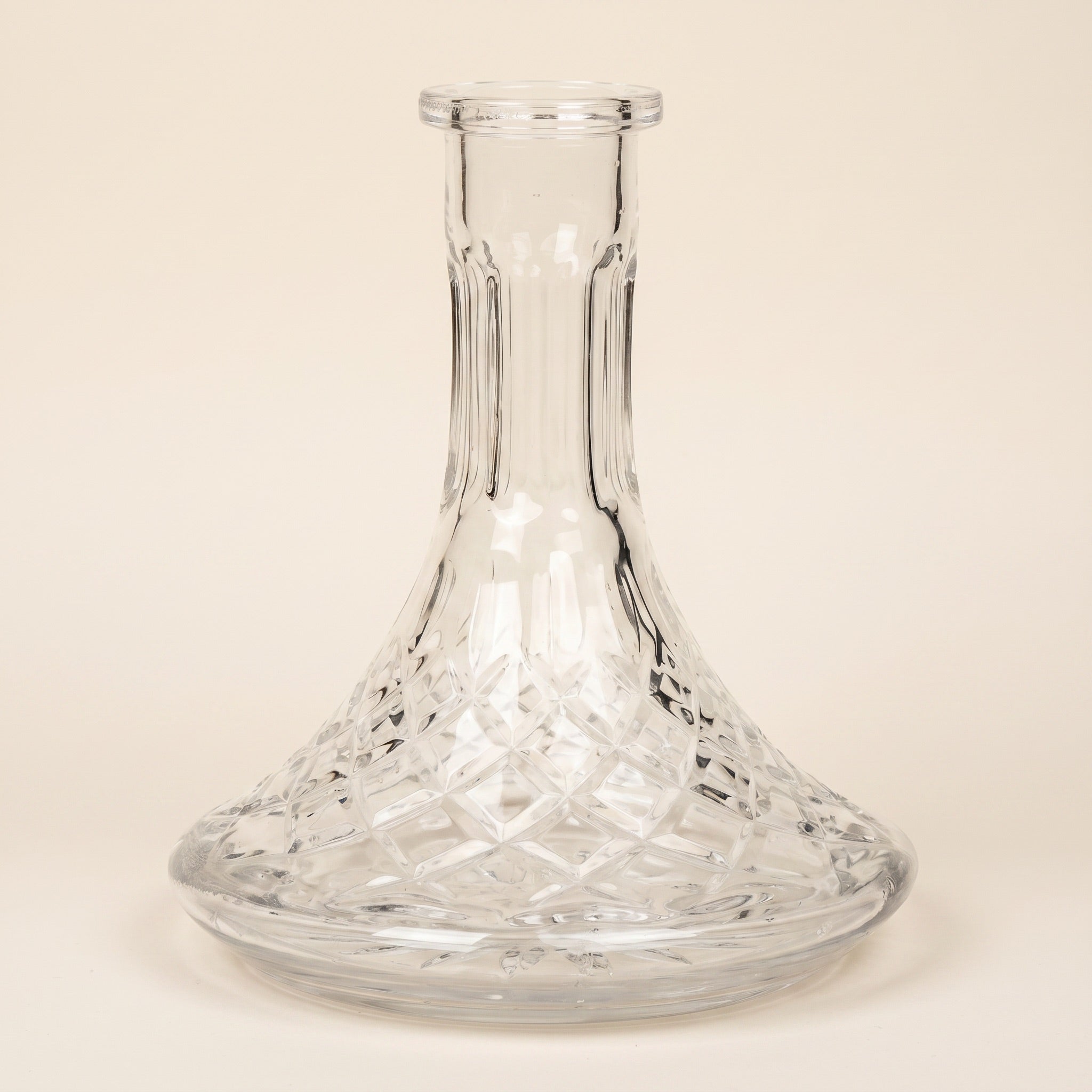 Lismore crystal-cut glass hookah base showing full diamond-cut lattice on warm cream studio backdrop