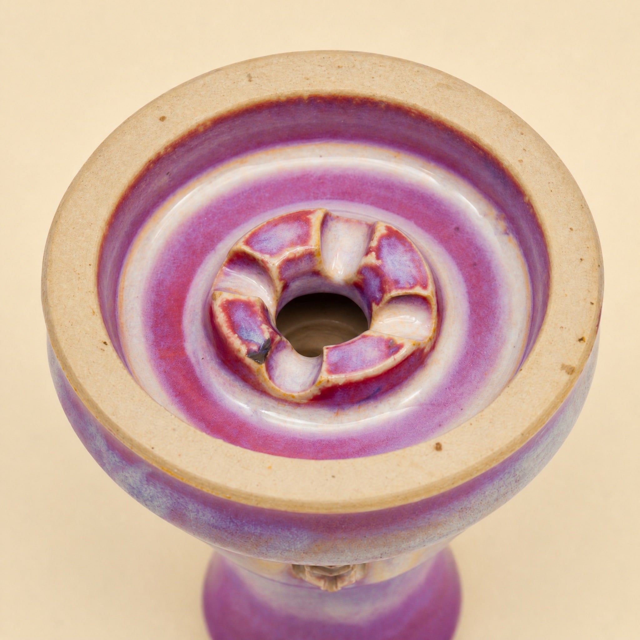 MIT Luxury Ashera Coral bowl macro top-down detail of rose-mauve glaze pooling around the phunnel spire