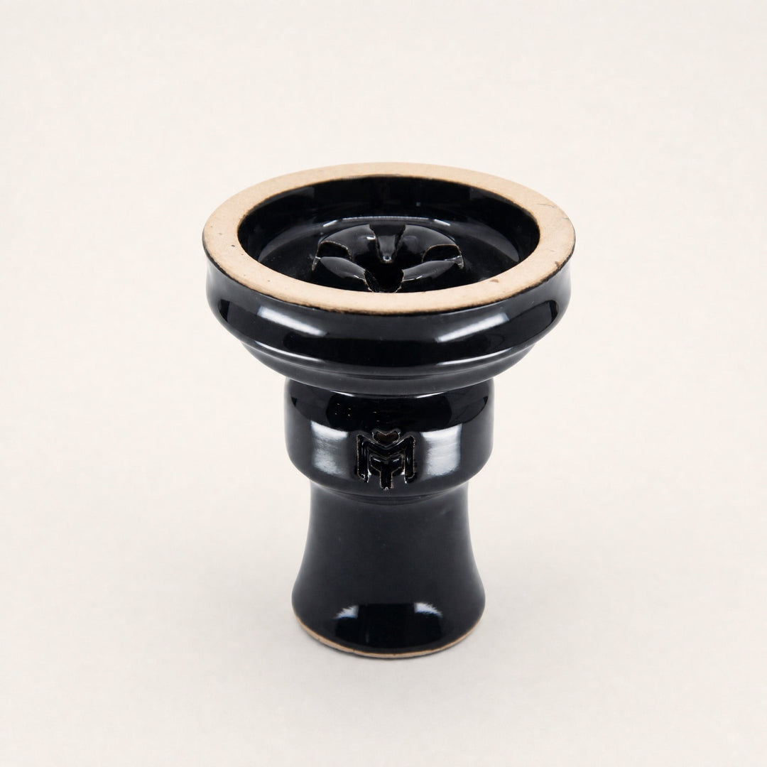 MIT Luxury Ashera Eclipse phunnel bowl, glossy obsidian-black glaze with raw stoneware rim, three-quarter studio view