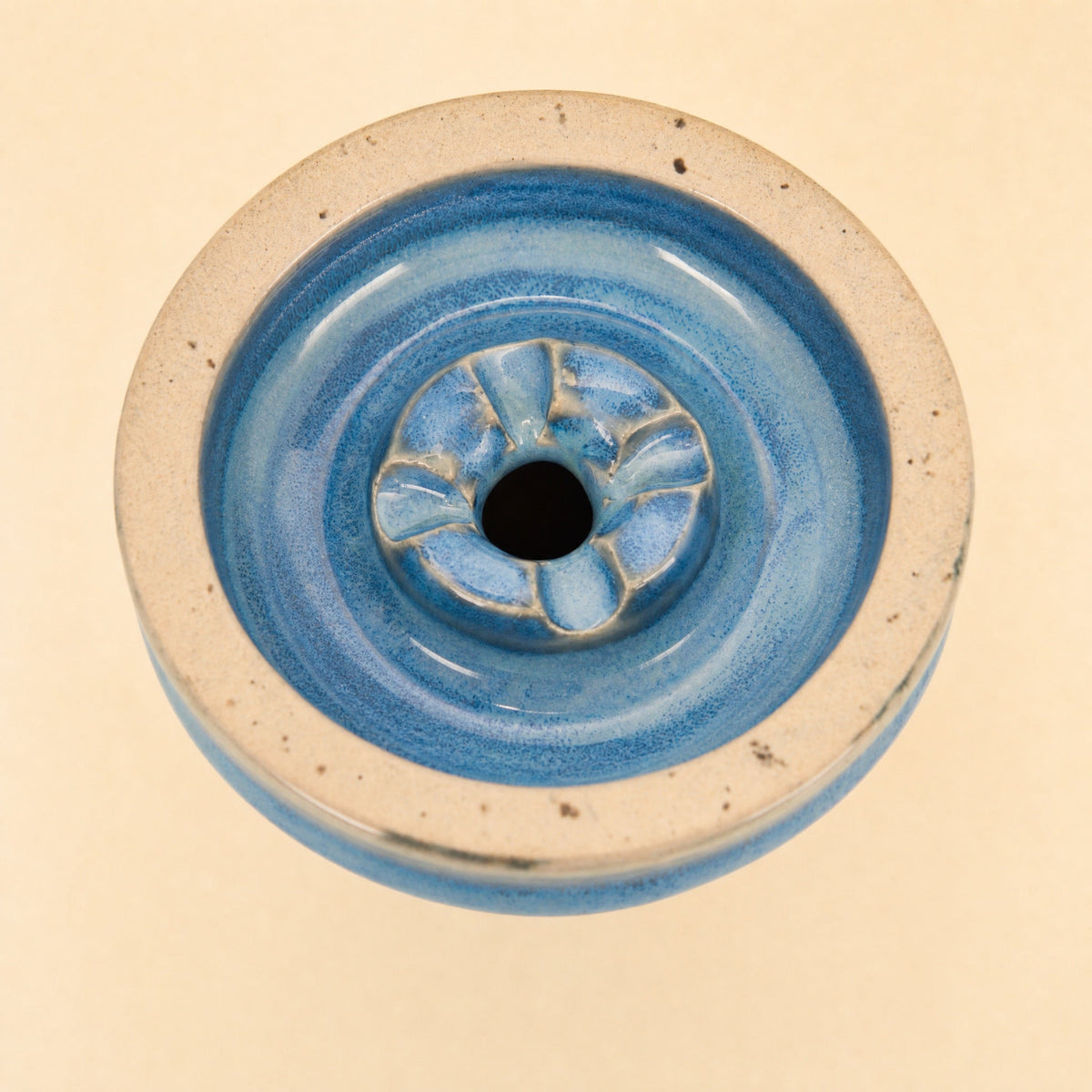 MIT Luxury Ashera Tide bowl macro top-down detail of azure-blue mottled glaze around the phunnel spire, image 6 of 6