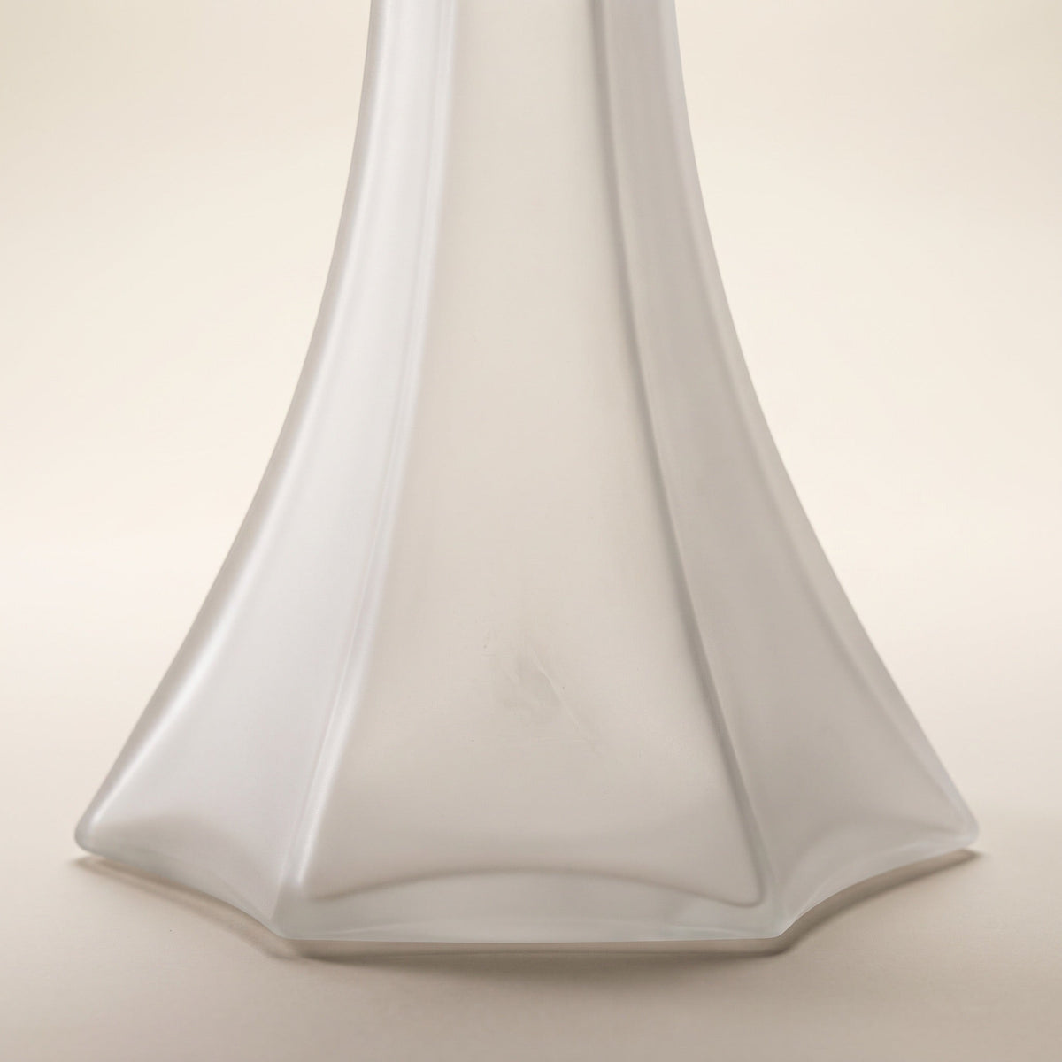 OVO x Neolux Frosty White hookah base close-up showing six-facet splayed skirt geometry and frosted glass finish, image 4 of 5
