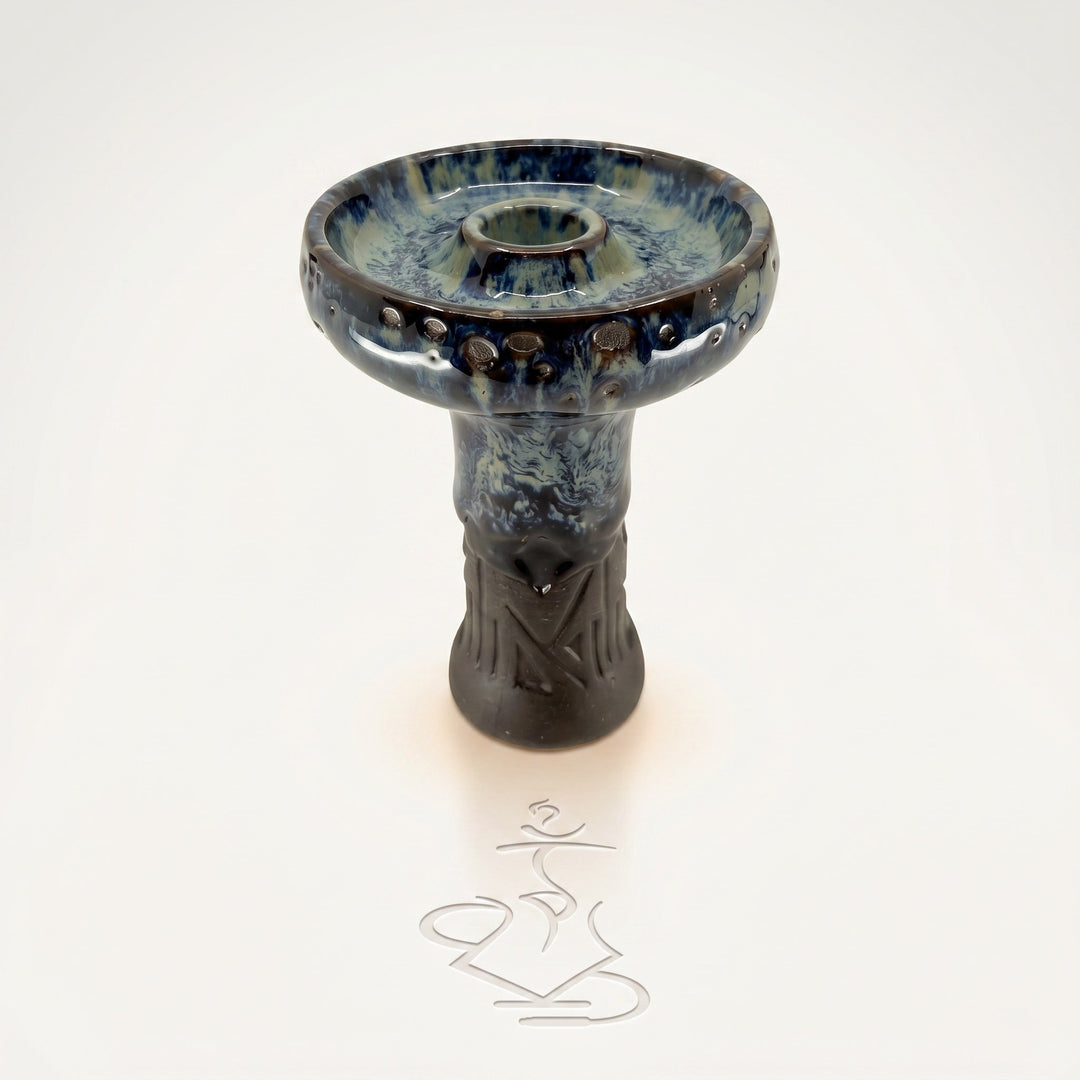 Queen phunnel bowl in Frozen on warm white studio sweep — glossy blue-teal reactive drip glaze, carved stem.