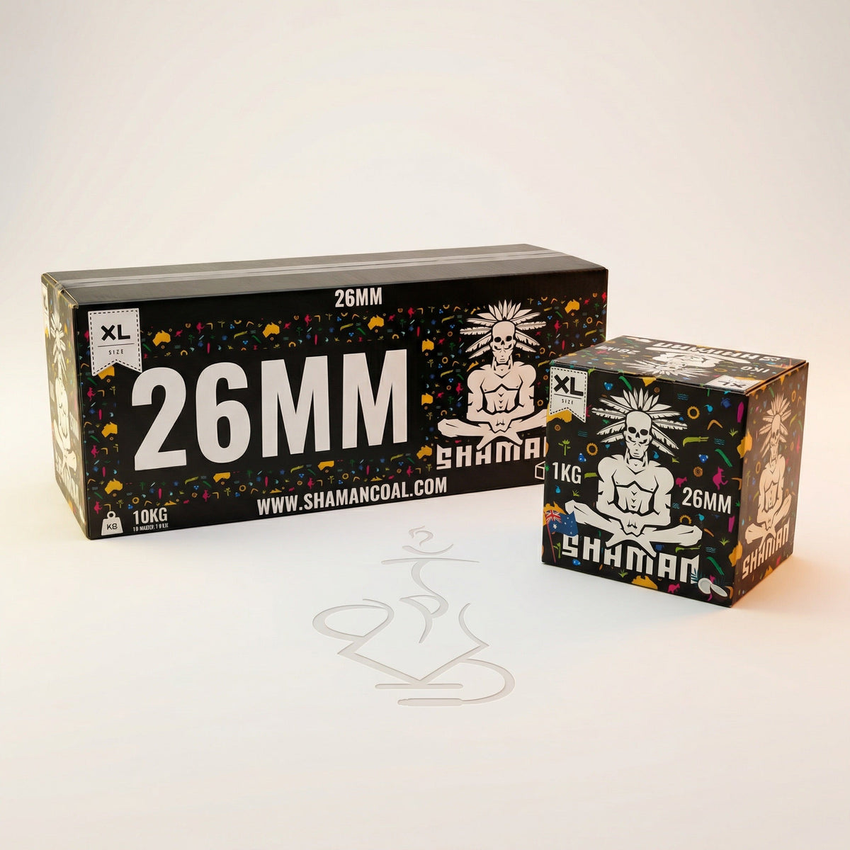 Shaman 26mm coconut charcoal 10kg master box and 1kg box displayed side by side showing the scale difference in a professional studio setting.