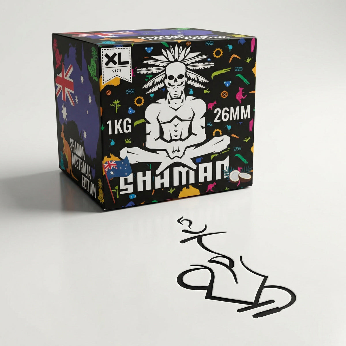 Shaman 26mm coconut charcoal 1kg box at a three-quarter angle showing the skull mascot and Australia Edition panel in a professional studio setting., image 5 of 15