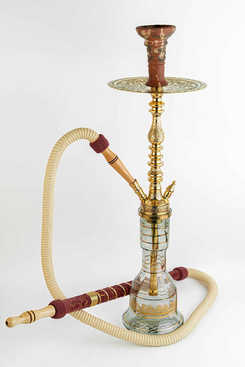 Shika Elwel CNC Brass Shisha Pipe, shown with a glass base and hose, both sold separately, on white