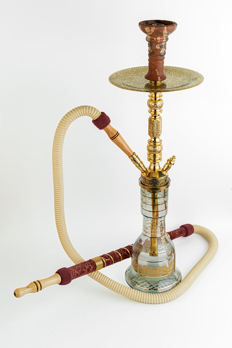 Shika Shogun CNC Brass Shisha Pipe, shown with a glass base and hose, both sold separately, on white