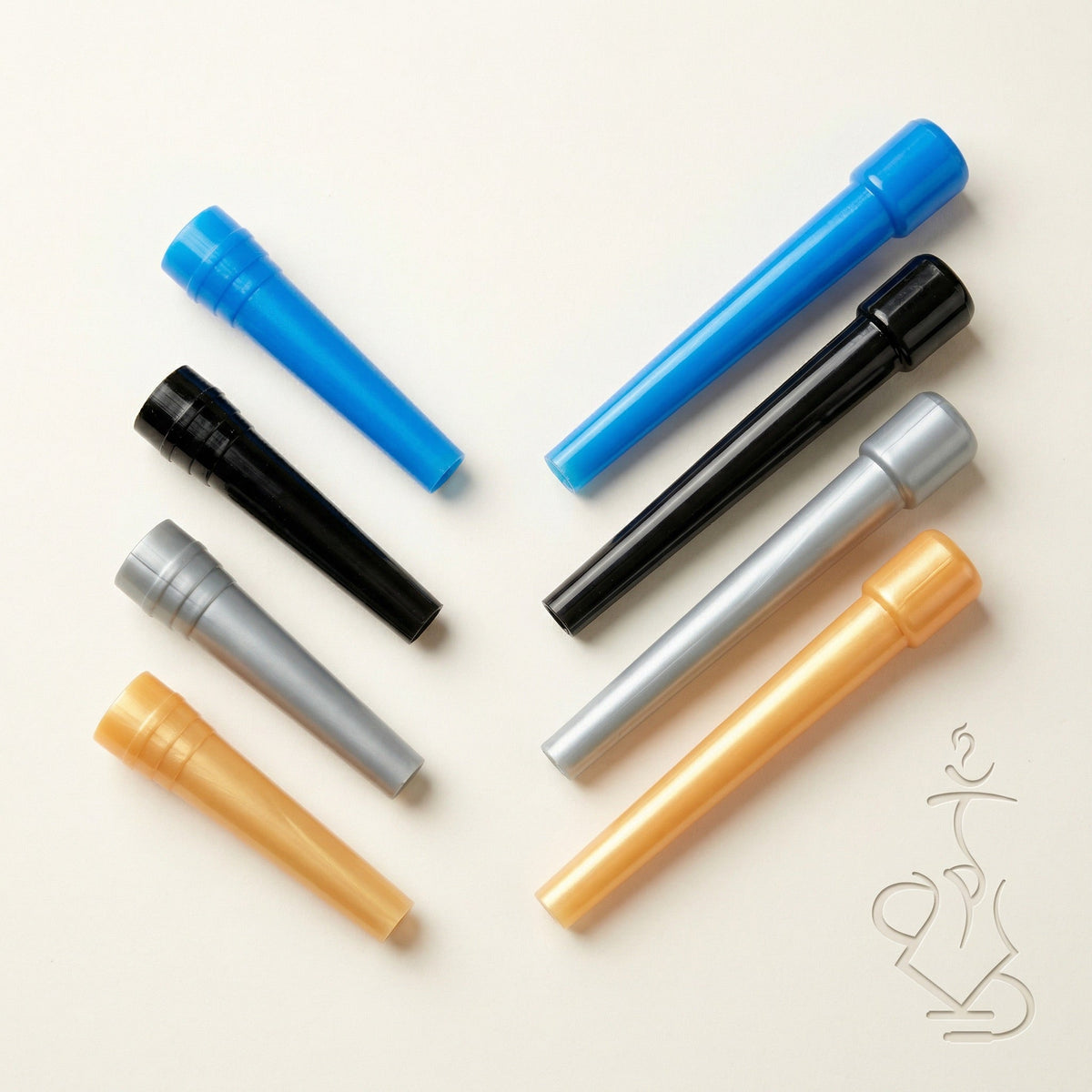 ShishaDoc disposable hookah mouth tips in short and long sizes showing all four colours — blue, black, silver, and orange — on warm white studio background, image 2 of 13