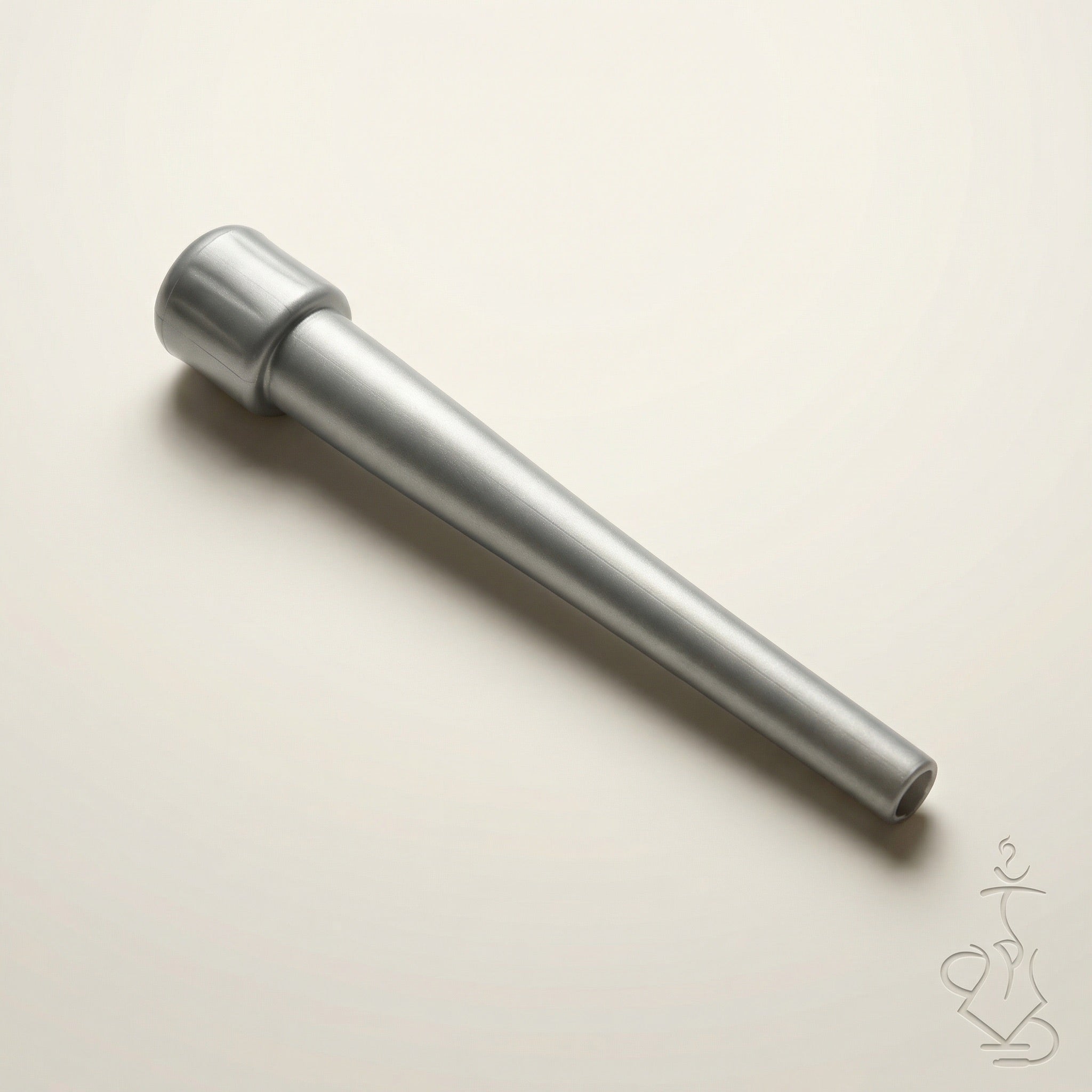 ShishaDoc disposable hookah mouth tip in long matte metallic silver on warm white studio background