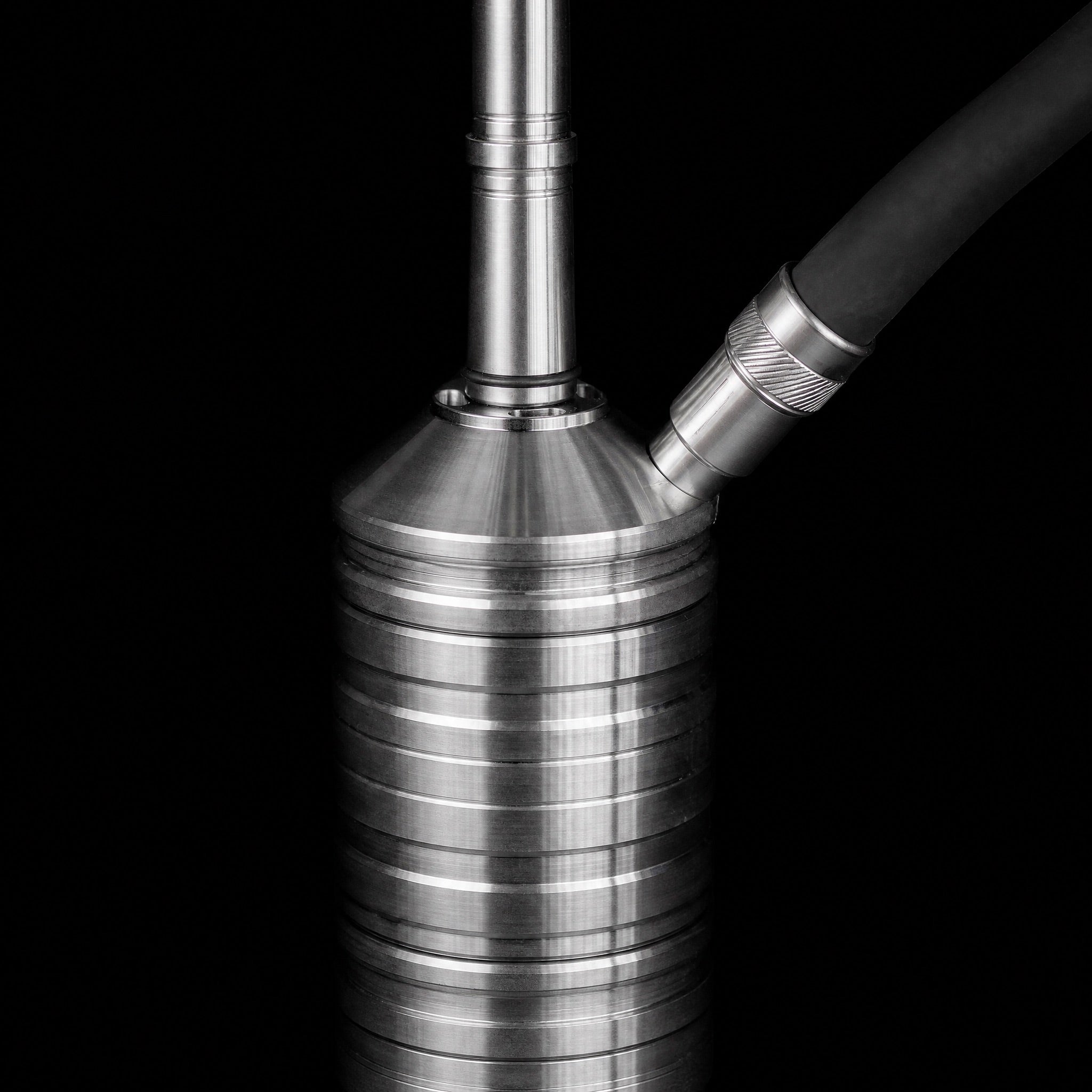 Steamulation Ultimate One Gen II dual connection hose port with hose attached close-up detail