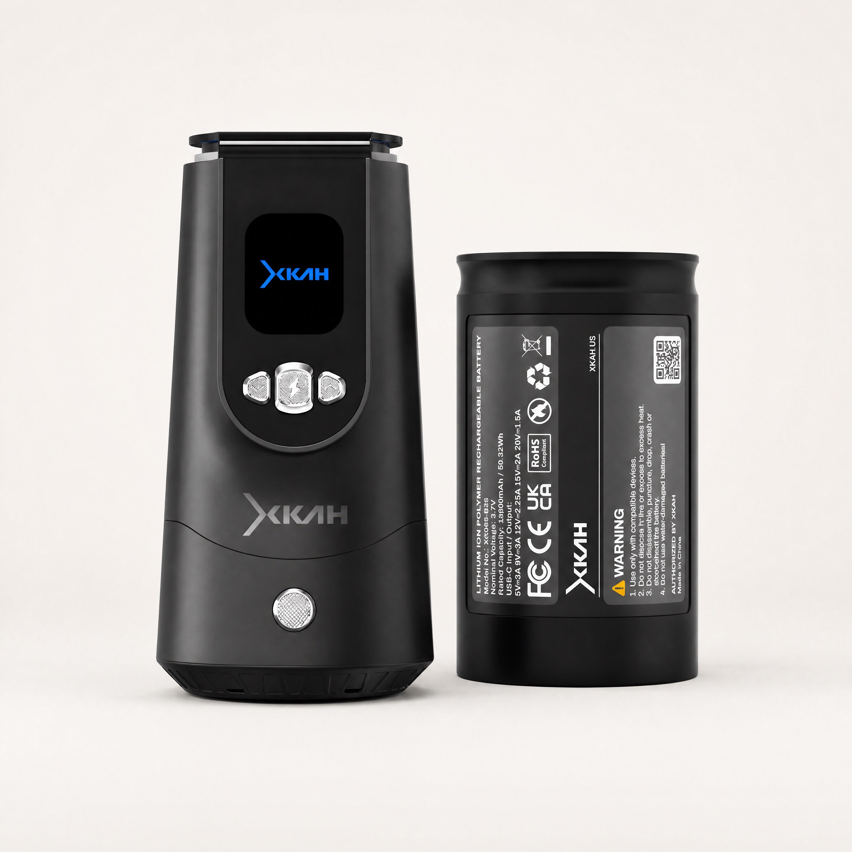 XKAH Pro eHMD beside cylindrical 13,600 mAh spare battery in clean studio composition — The Premium Shisha